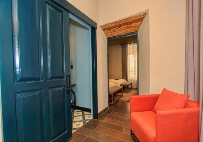 Bed in Antigua Trece Hotel Fusión