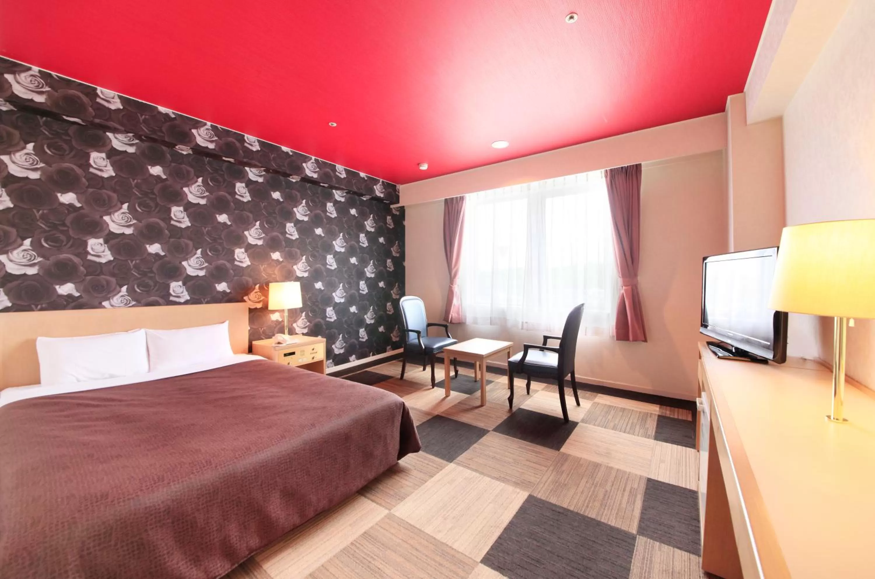 Photo of the whole room, Bed in Quintessa Hotel Iseshima