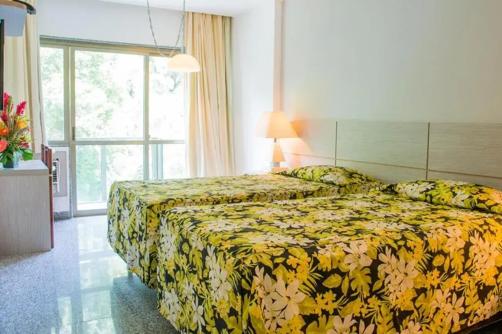 Bed in Royalty Copacabana Hotel