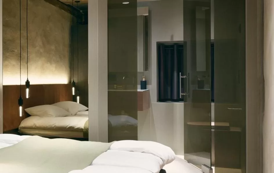 Bedroom, Bed in Tollboden Hotell - Unike Hoteller