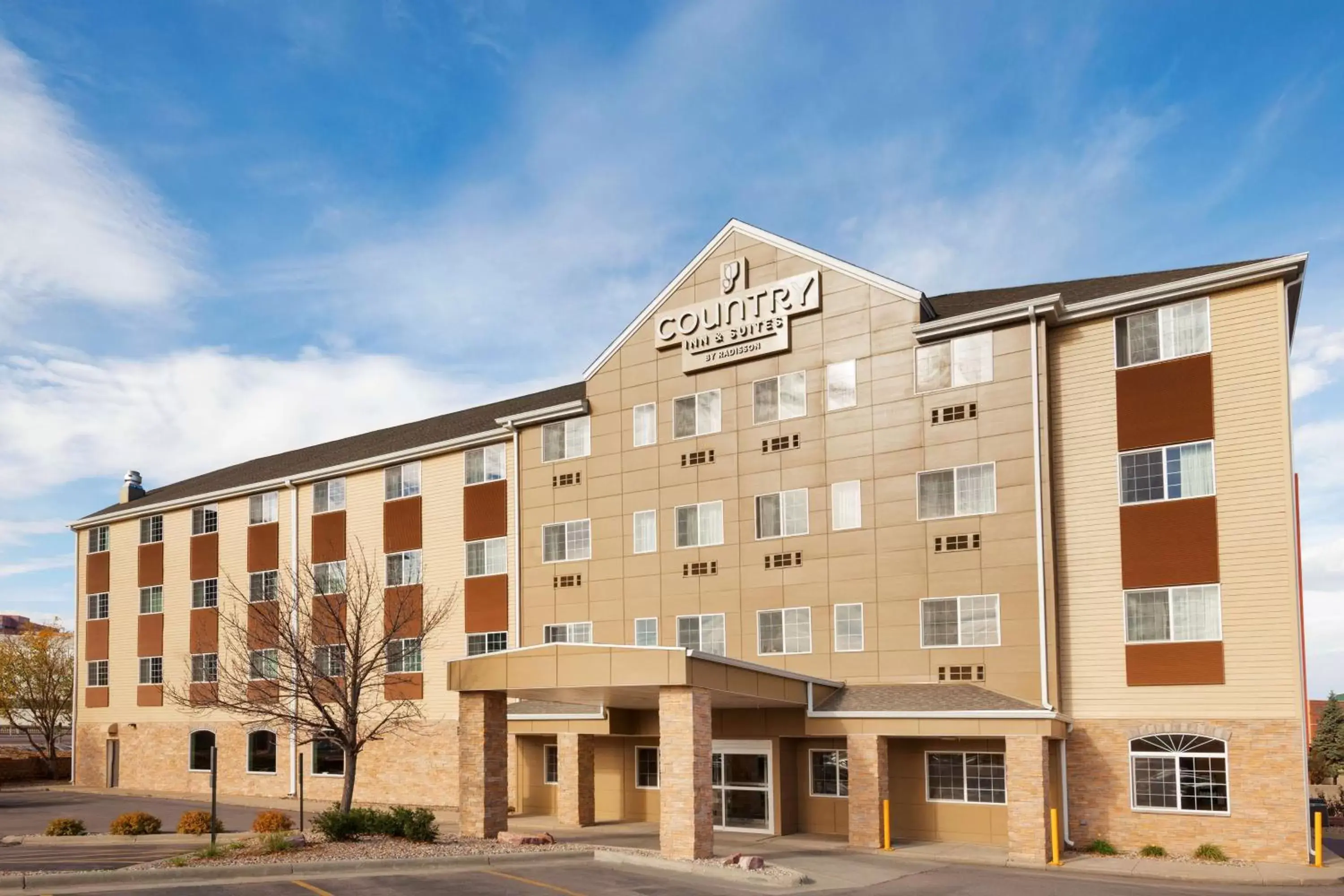 Property building in Country Inn & Suites by Radisson, Sioux Falls, SD