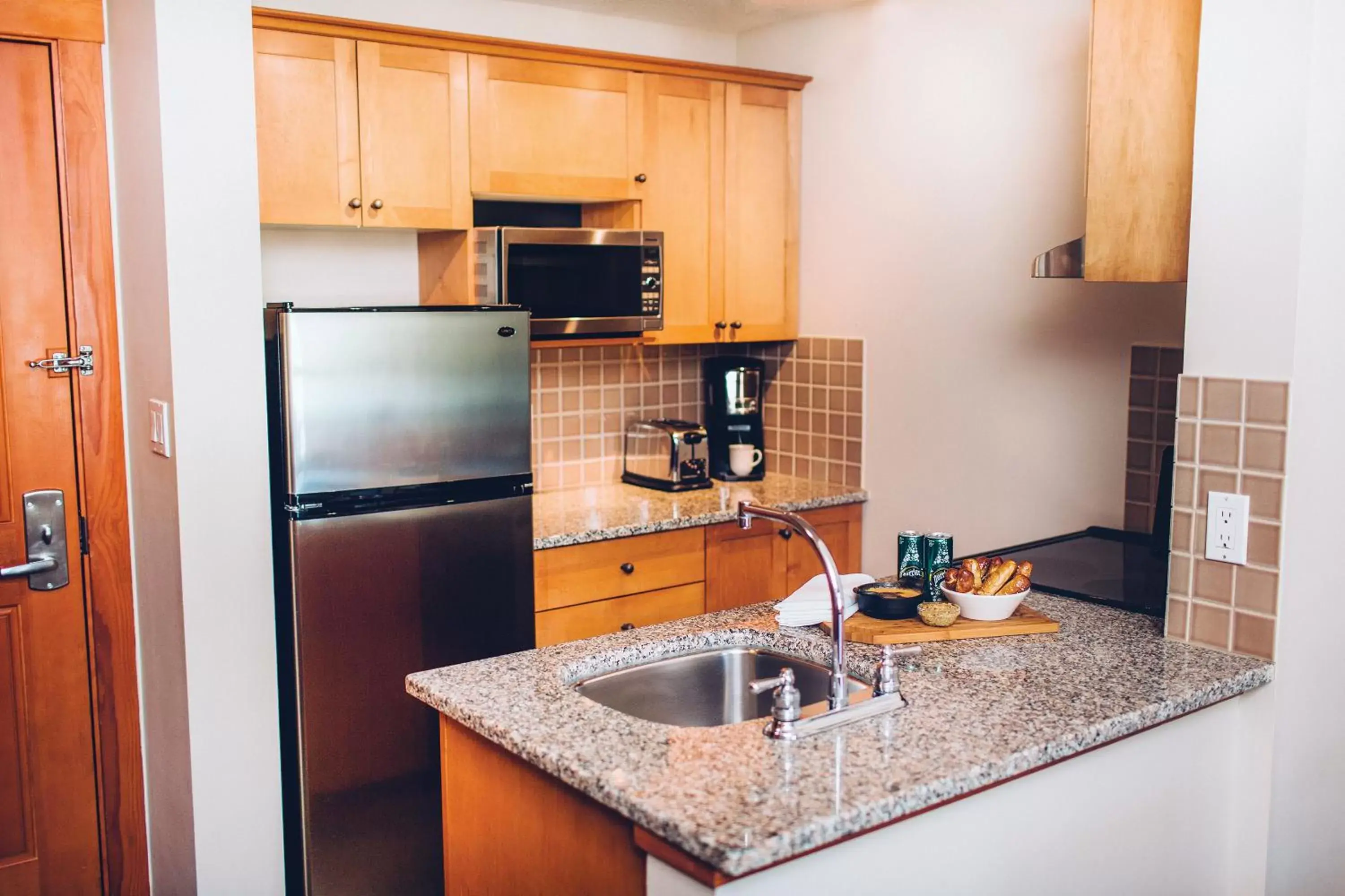 Kitchen or kitchenette, Kitchen/Kitchenette in Pan Pacific Whistler Mountainside