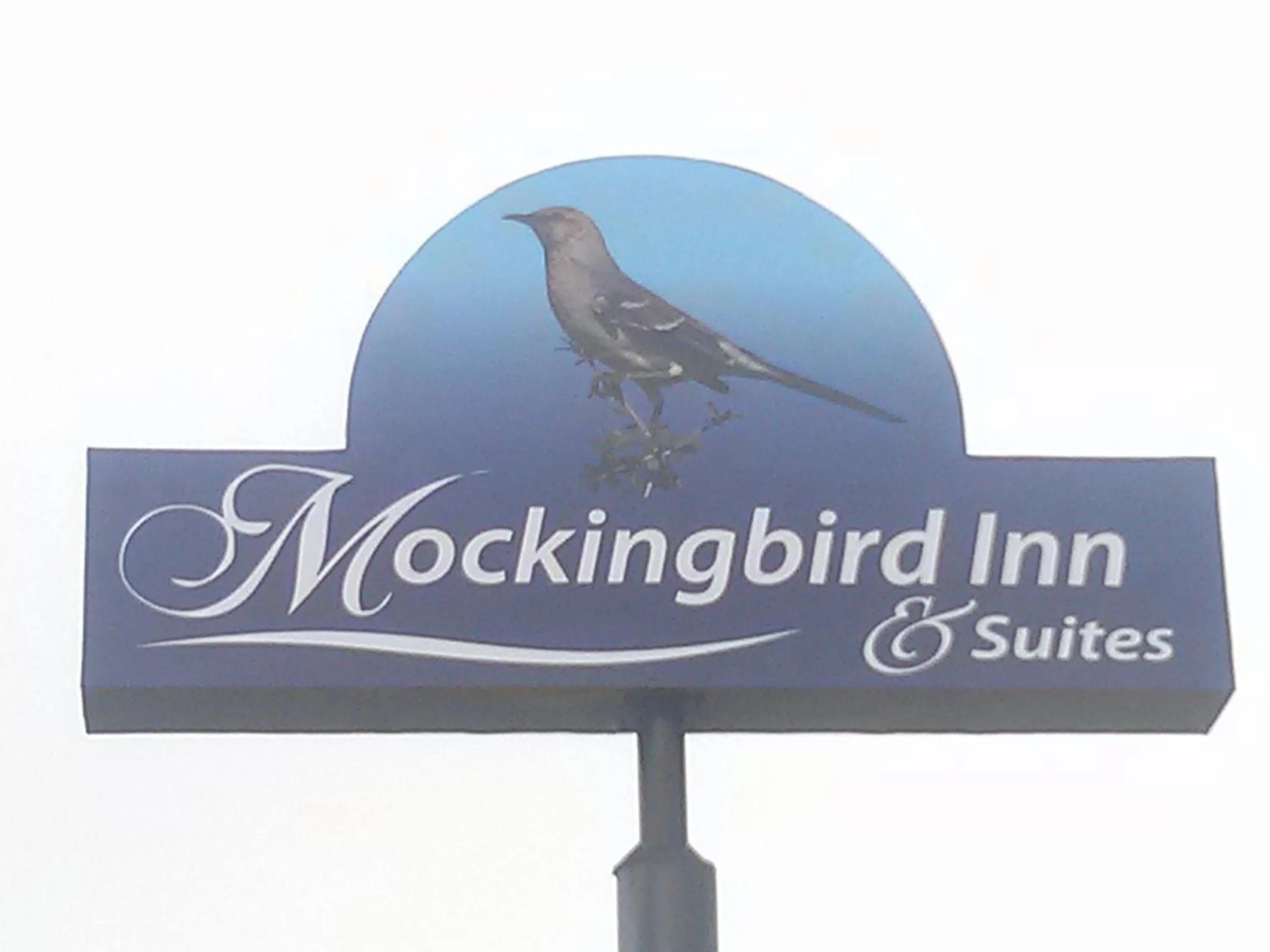Property logo or sign in Mockingbird Inn & Suites
