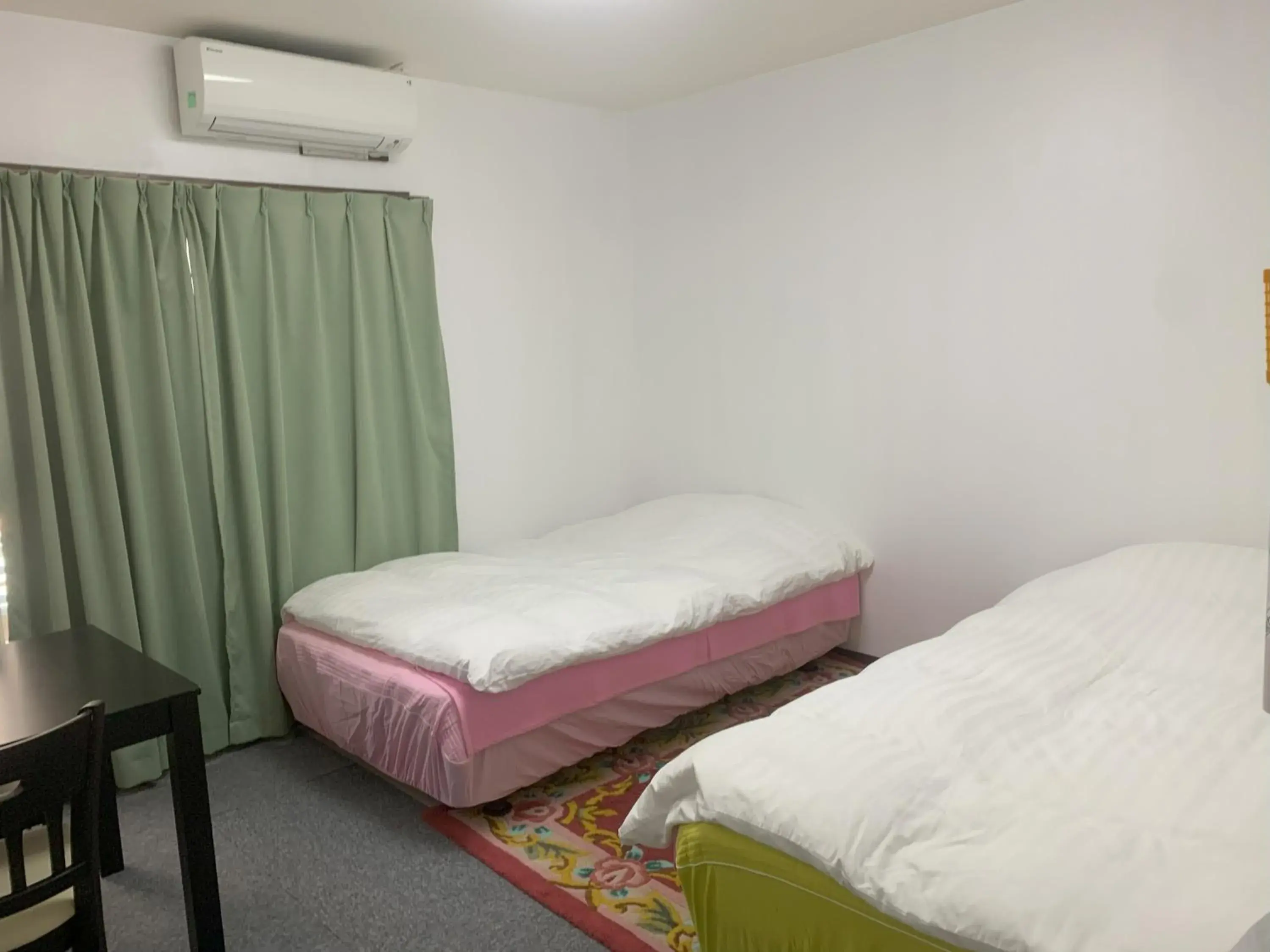 Bed in Oyama Guest House Kyoto