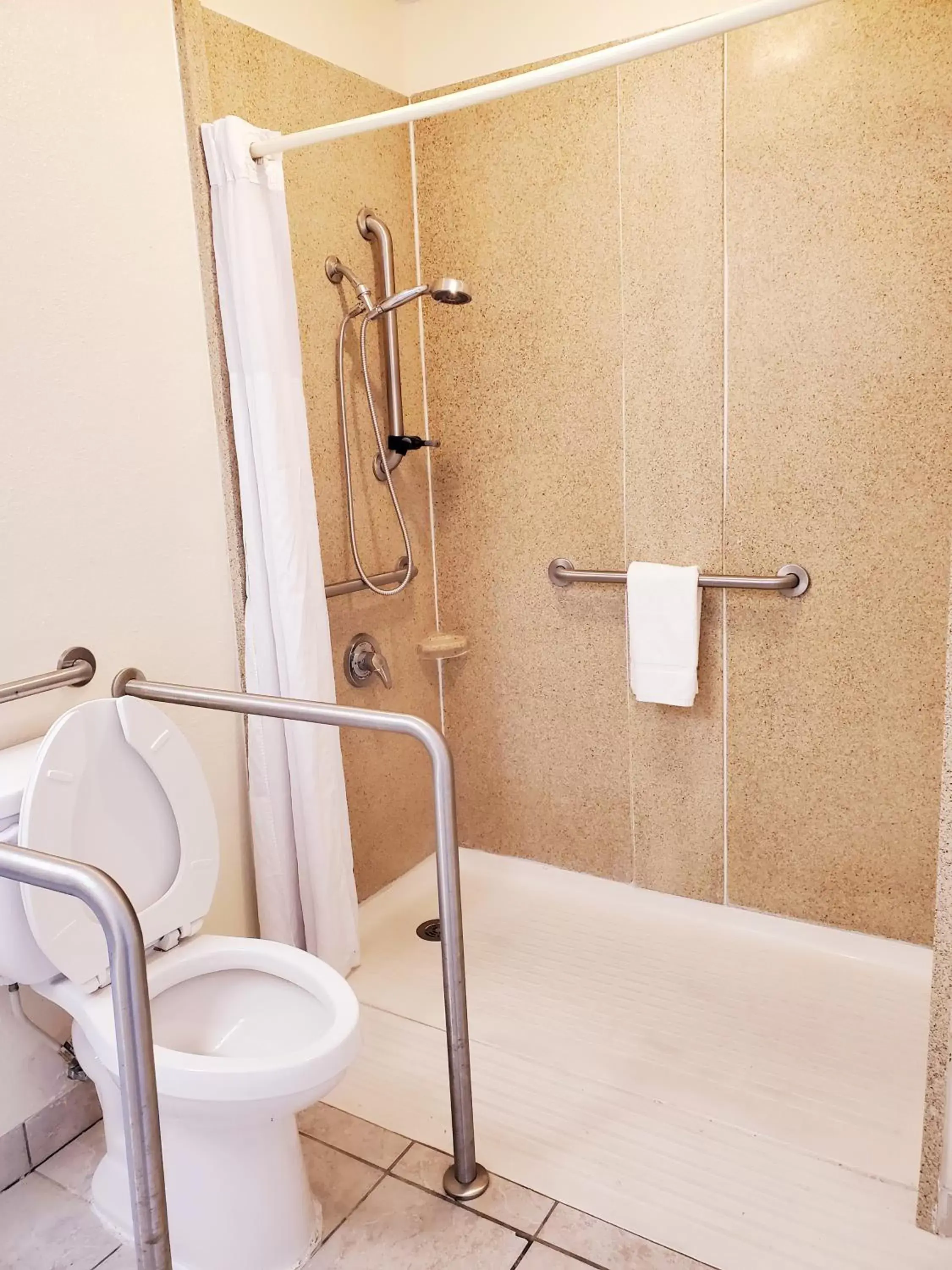 Bathroom in Days Inn by Wyndham Titusville Kennedy Space Center Bathroom in Days Inn by Wyndham Titusville Kennedy Space Center