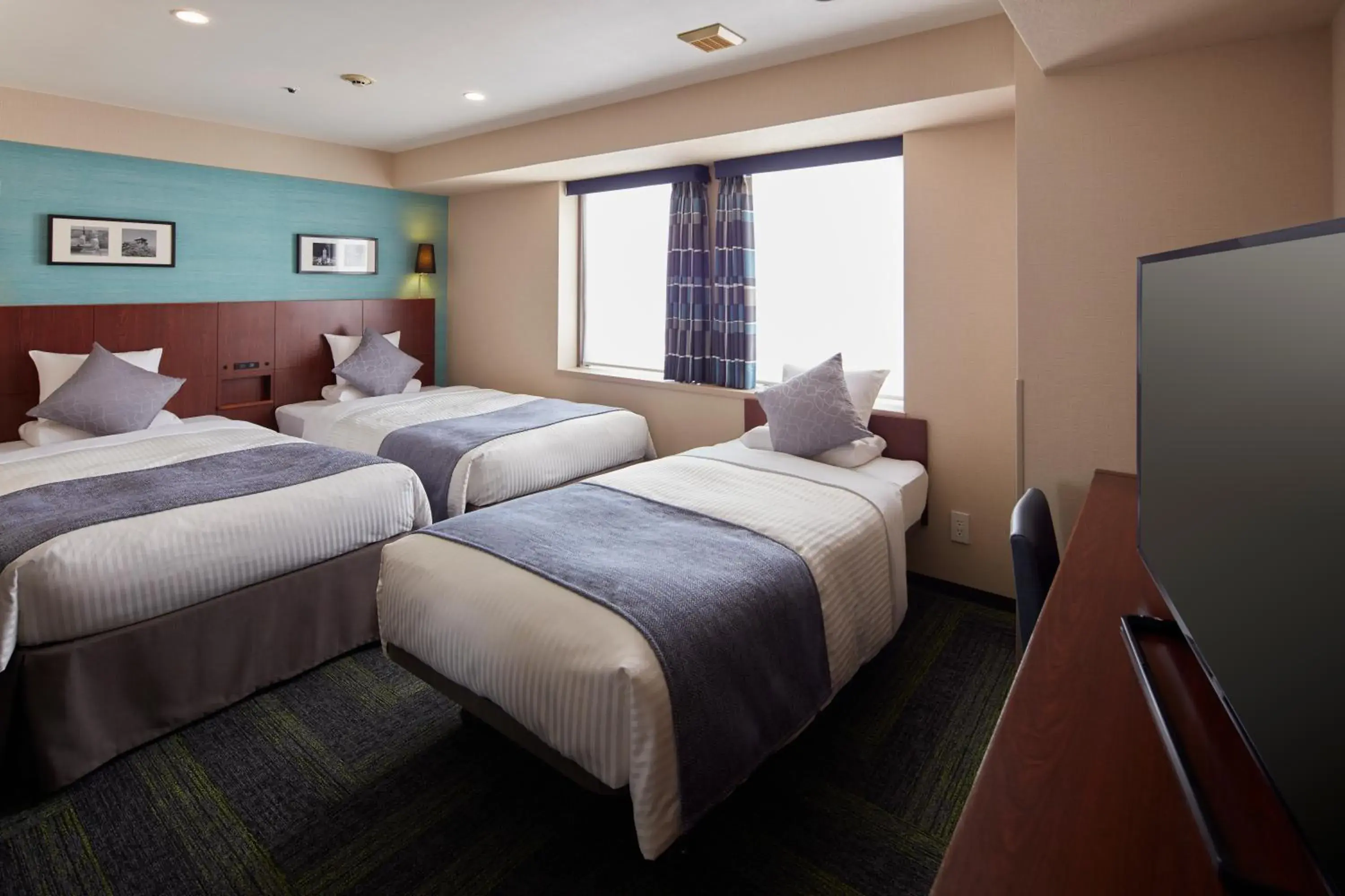 Bed in Hotel Mystays Yokohama