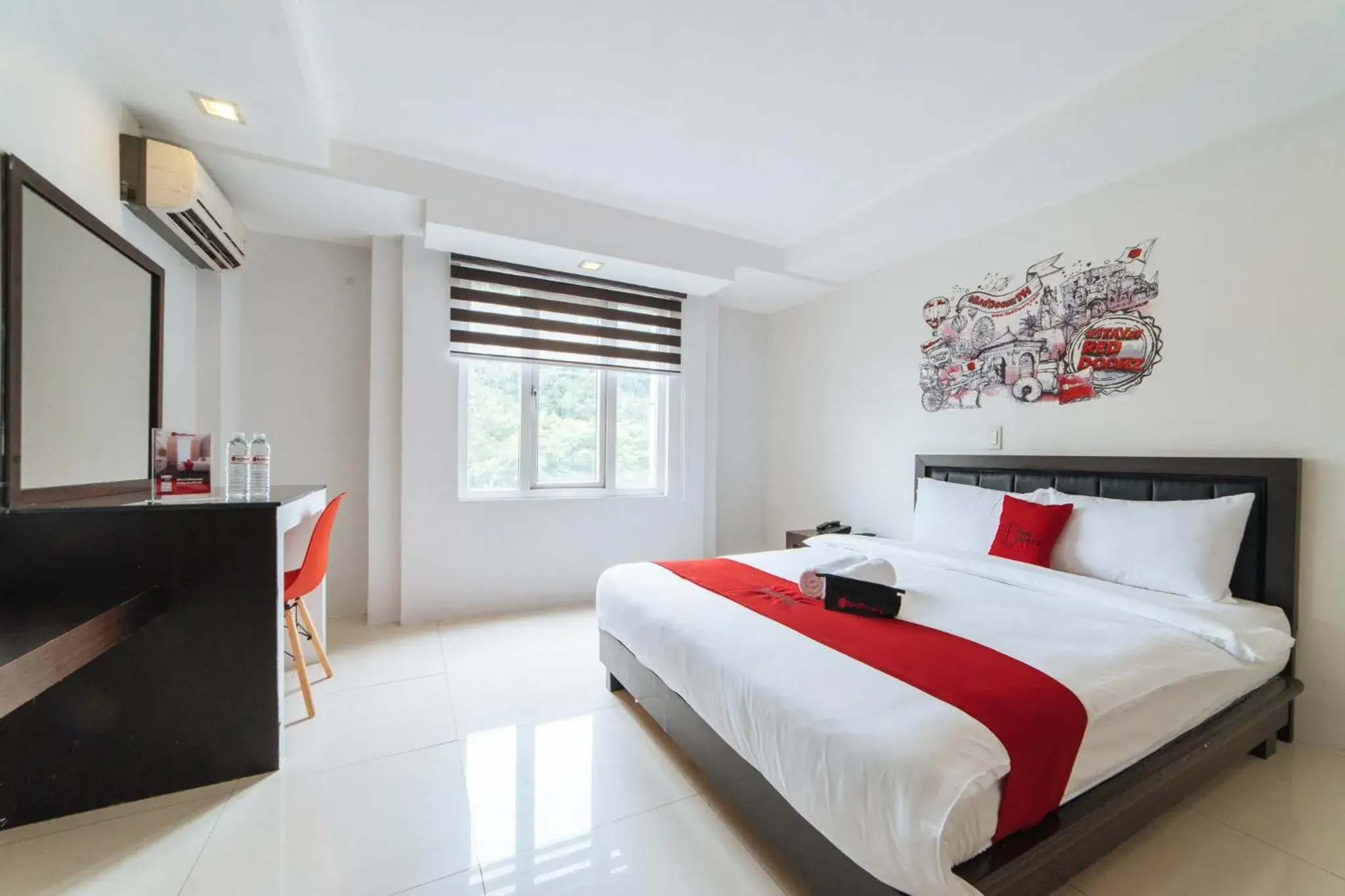 Bed in RedDoorz Plus at One Liberty Hotel Kalayaan Avenue