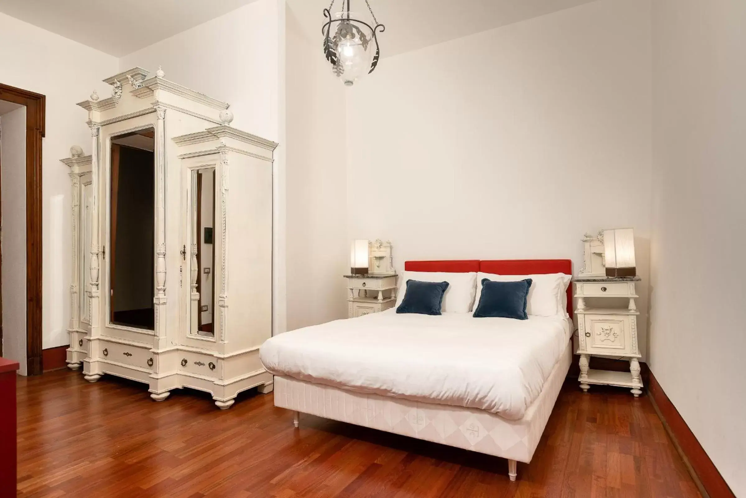 Bed in Bellezza Suites
