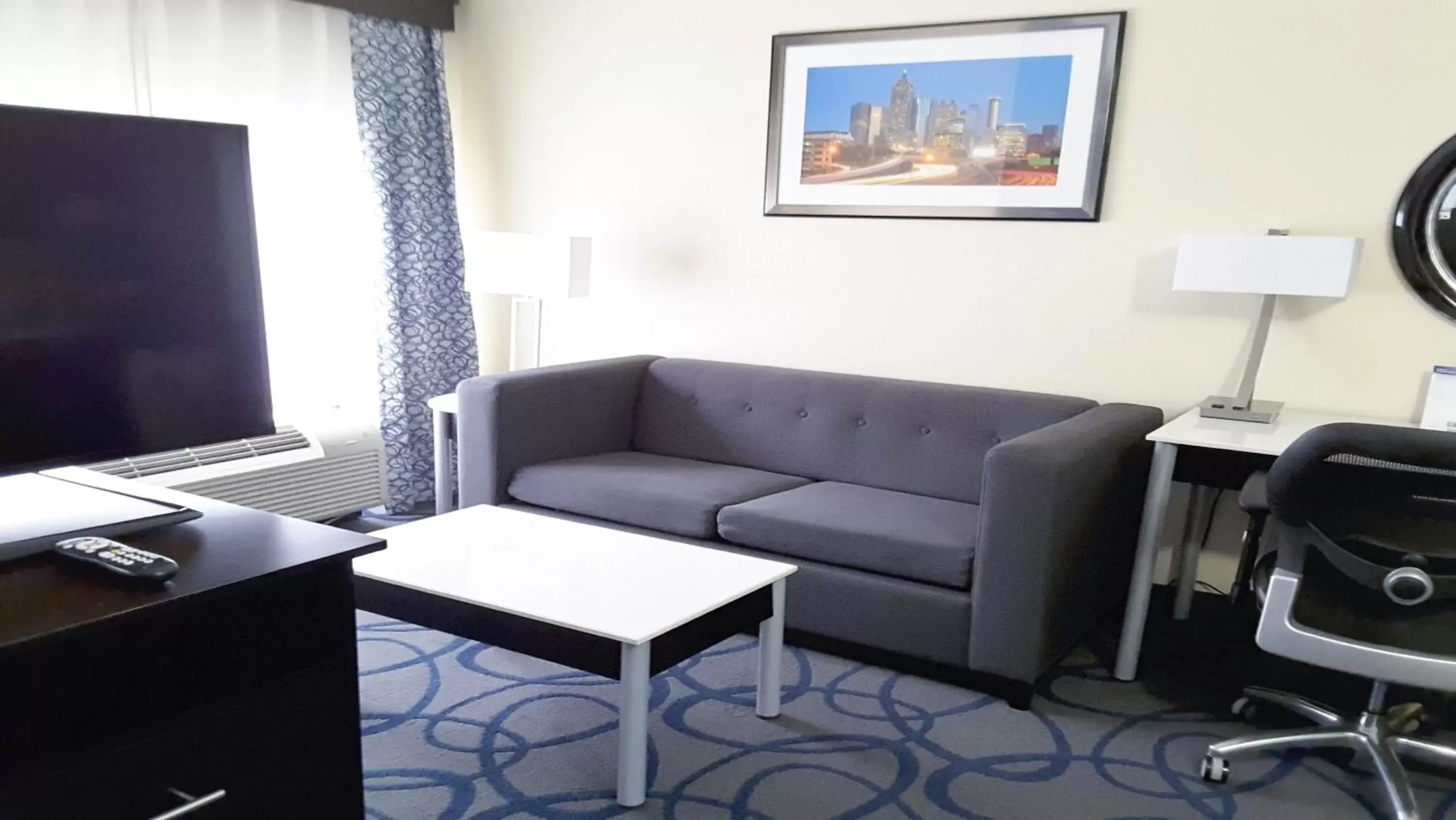Photo of the whole room, Seating Area in Holiday Inn Express Hotel & Suites Lawrenceville, an IHG Hotel