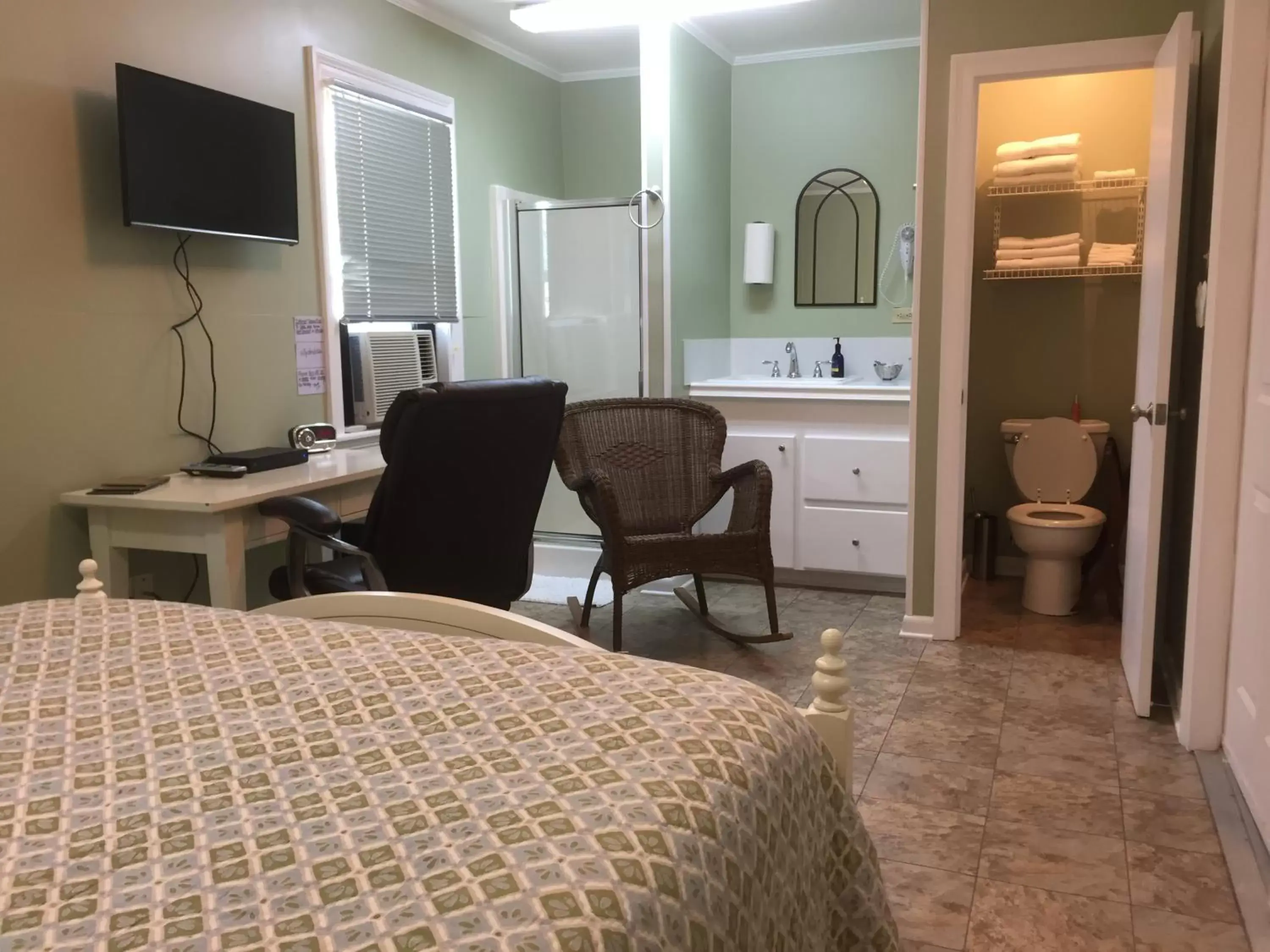 Bedroom, Seating Area in A Chateau on the Bayou Bed & Breakfast