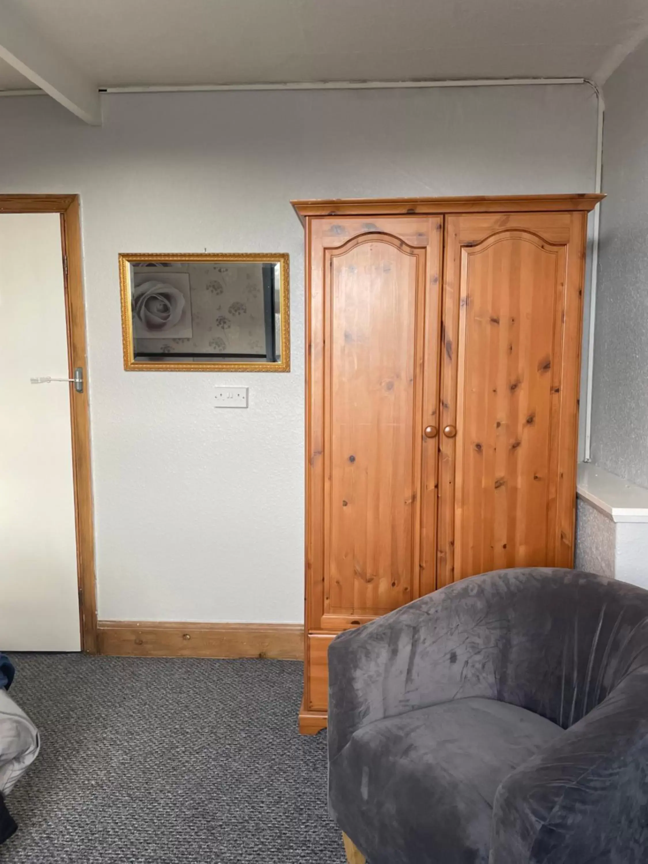 wardrobe, Seating Area in Whiteways Guest House