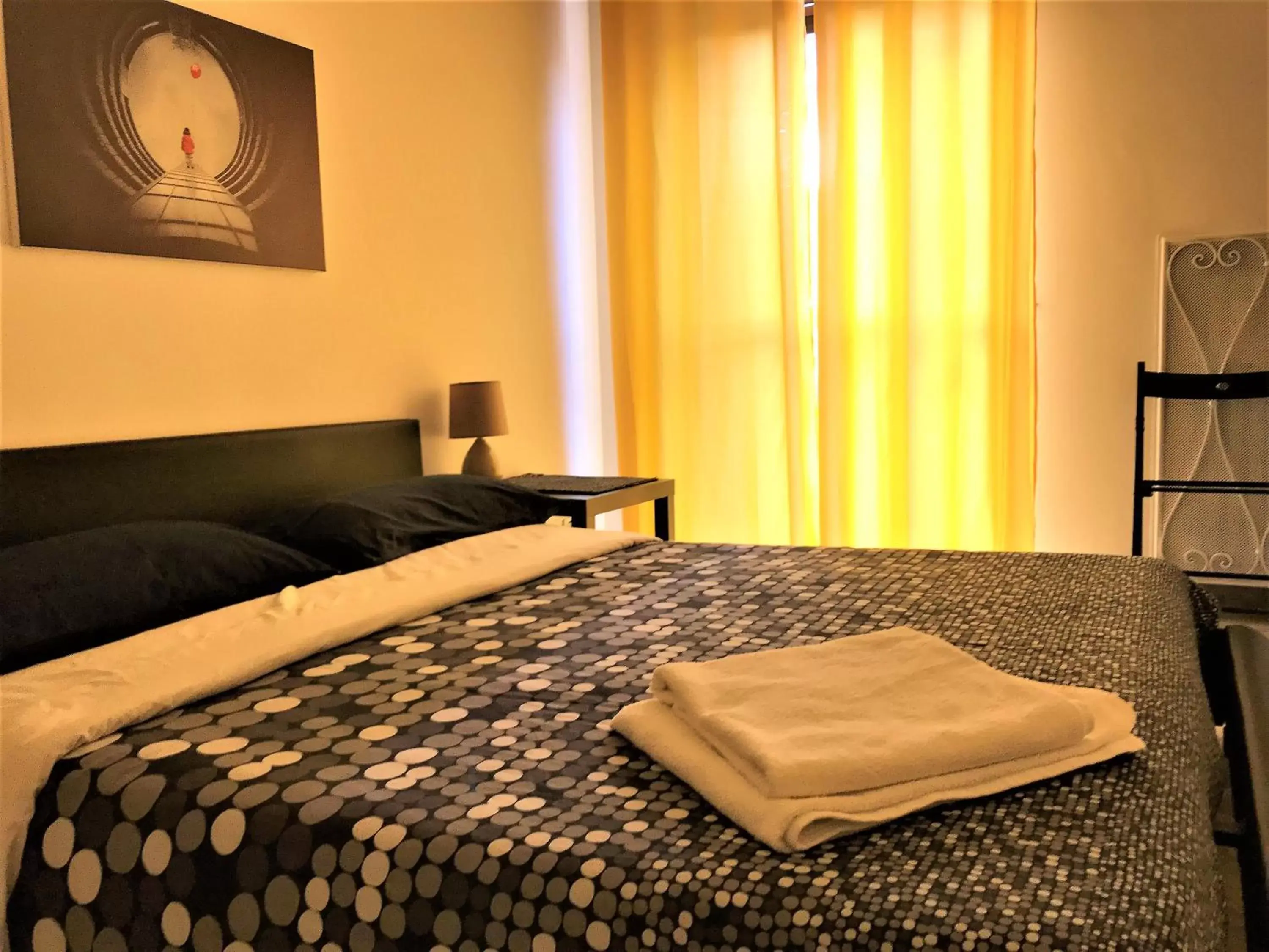 Bed in ROOM 110 BARI -guesthouse-