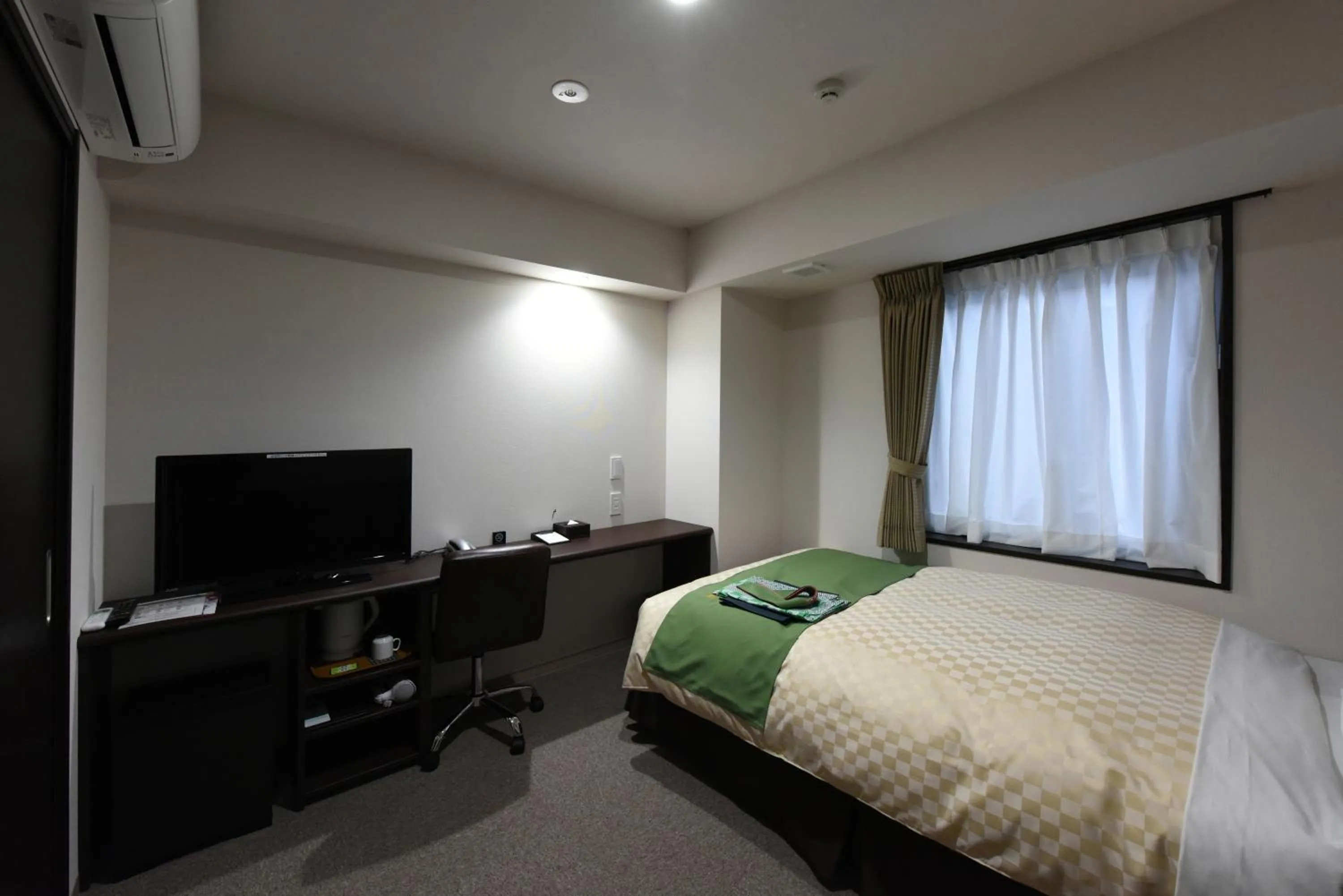 Bed in Hotel Showmeikan