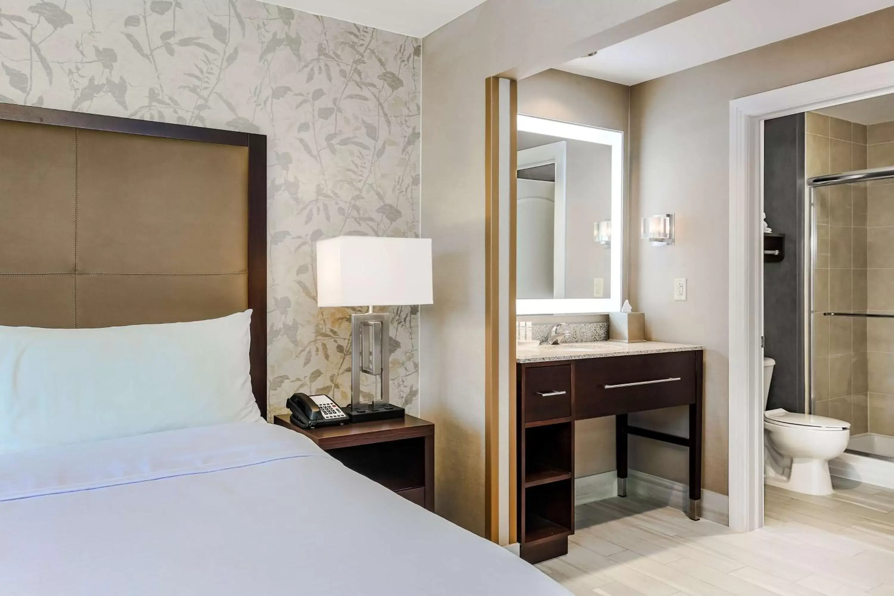 Bed in Homewood Suites by Hilton Long Island-Melville