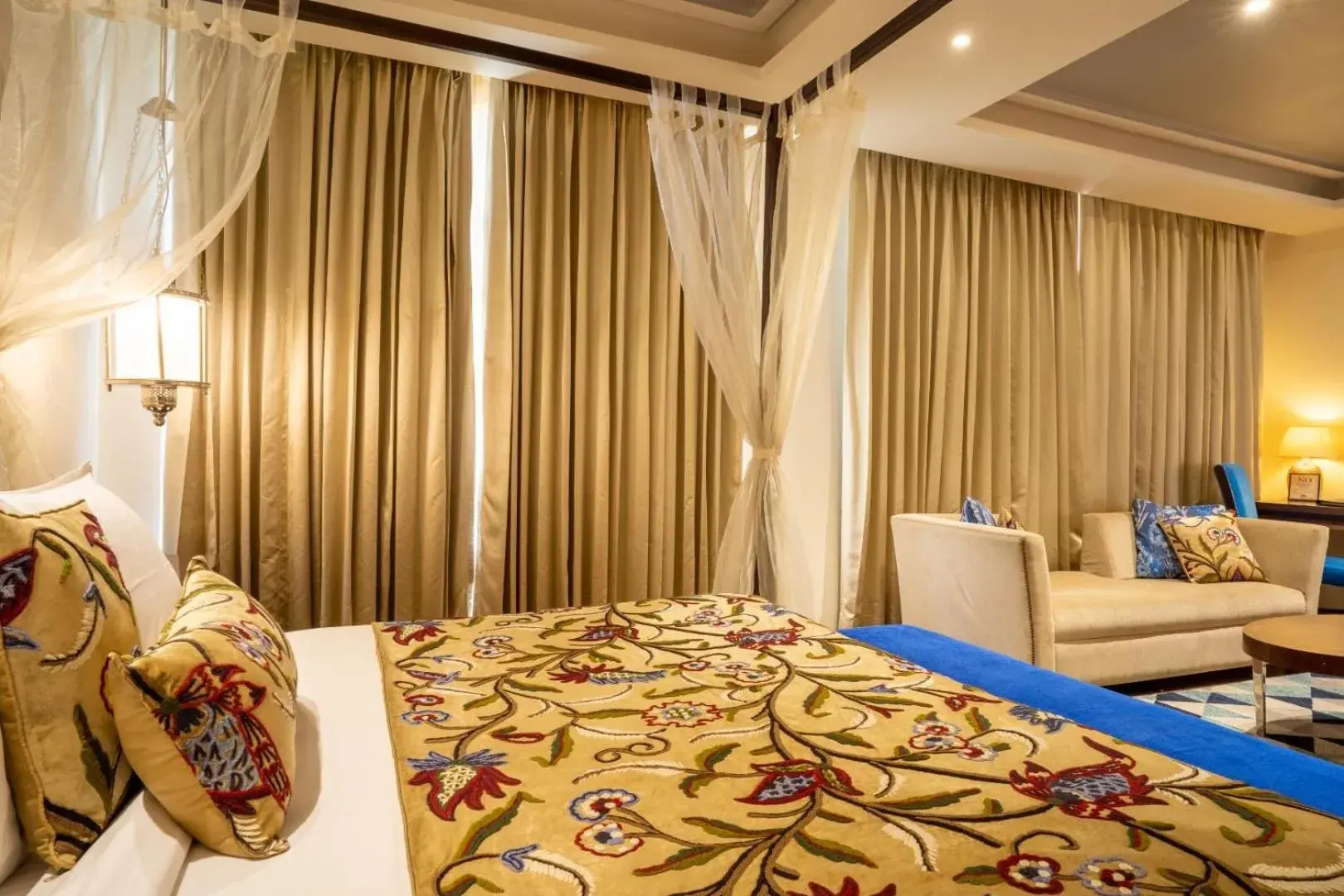 Living room, Bed in Indraprastha Spa Resort