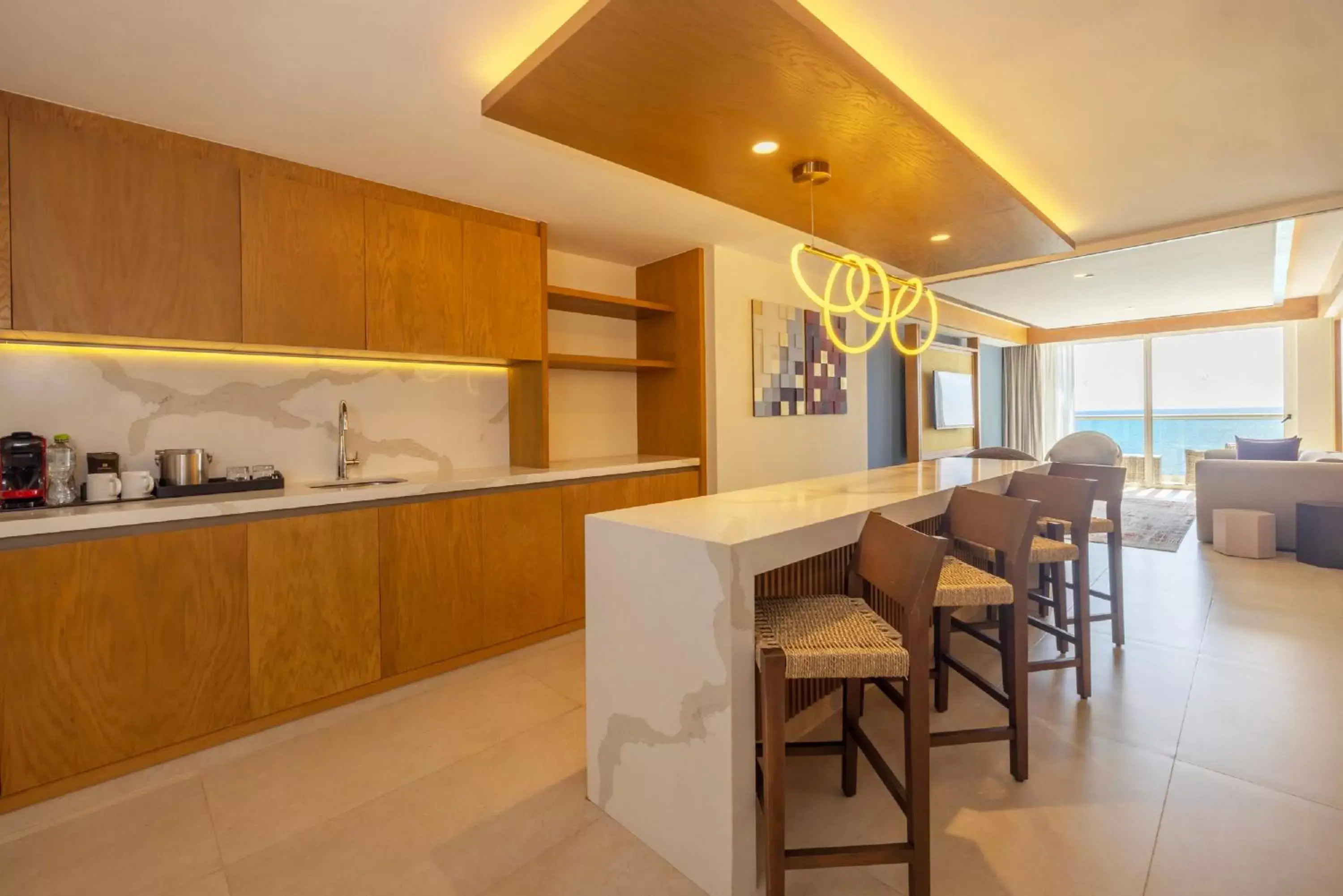 Living room, Kitchen/Kitchenette in Royalton Splash Riviera Cancun, An Autograph Collection All-Inclusive Resort