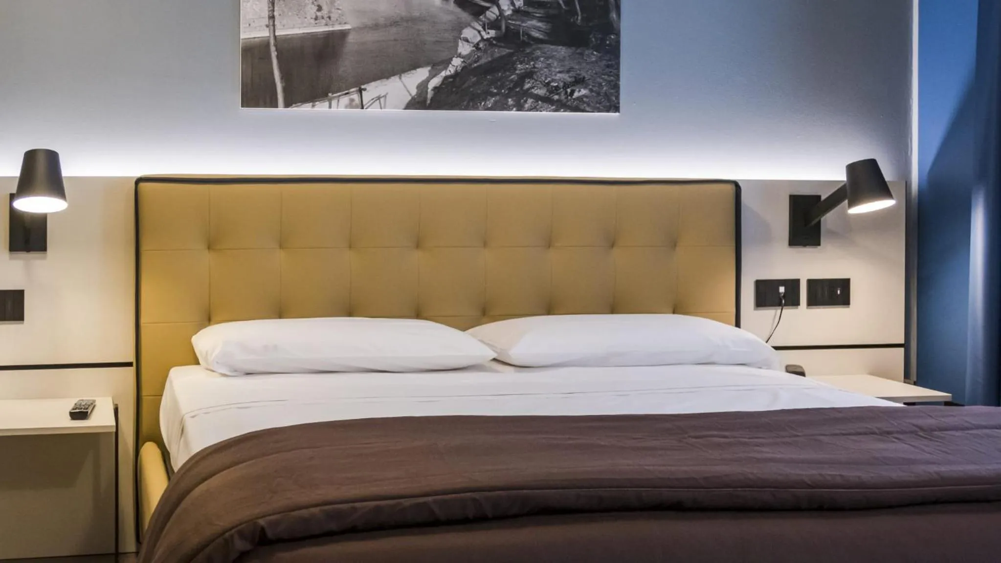 Bed in Hotel Puccini