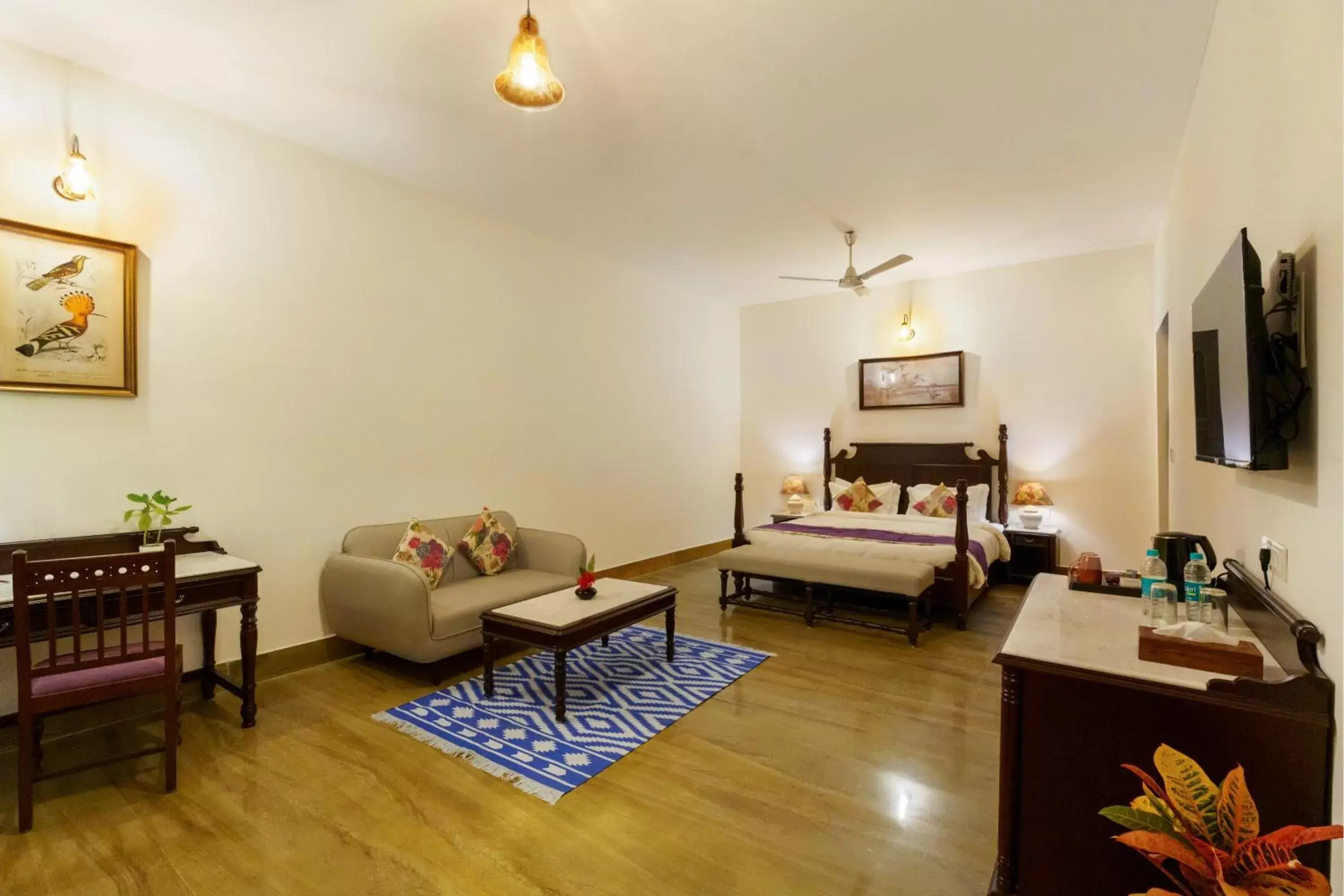 Bed, Seating Area in Anandam - A Luxury Resort in Udaipur