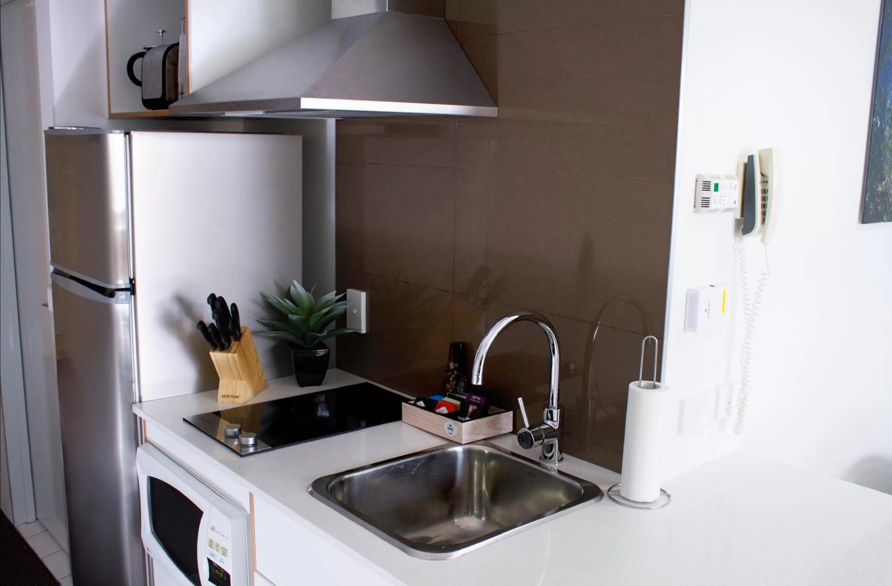 Kitchen or kitchenette in Ramada Resort by Wyndham Shoal Bay