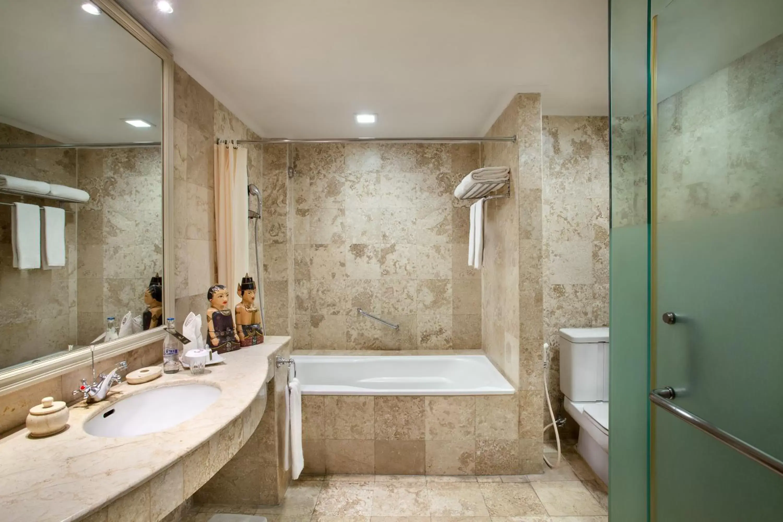 Bathroom in The Phoenix Hotel Yogyakarta - MGallery Collection