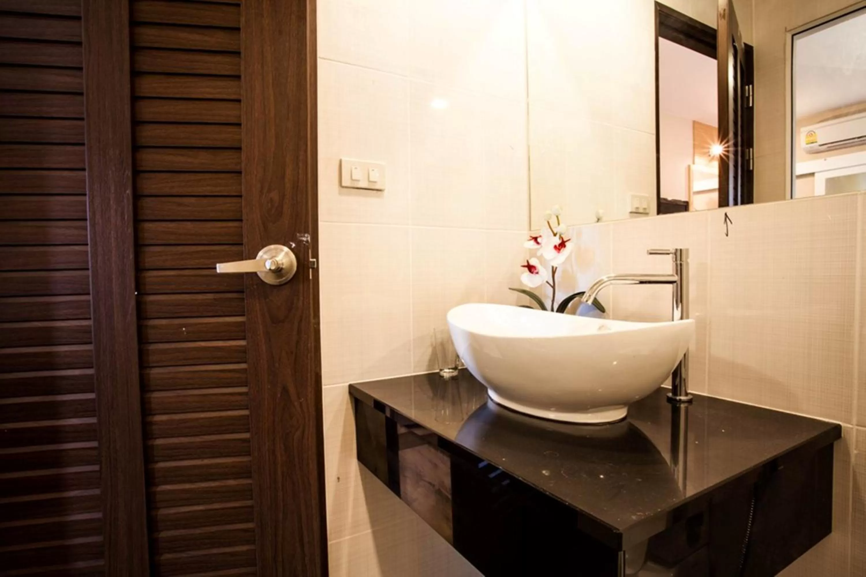Bathroom in The Aim Sathorn Hotel