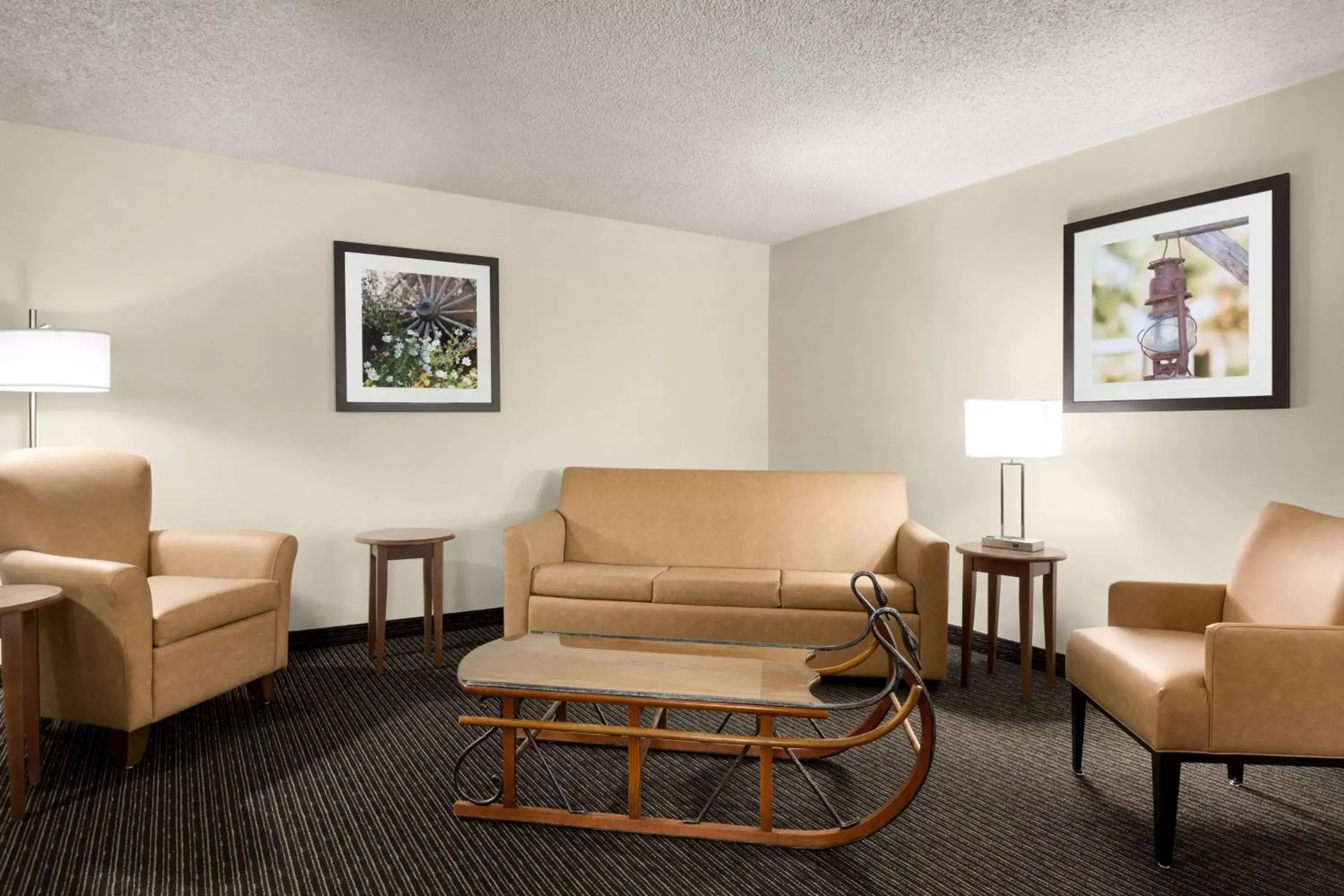 Bed, Seating Area in Baymont by Wyndham Whitefish