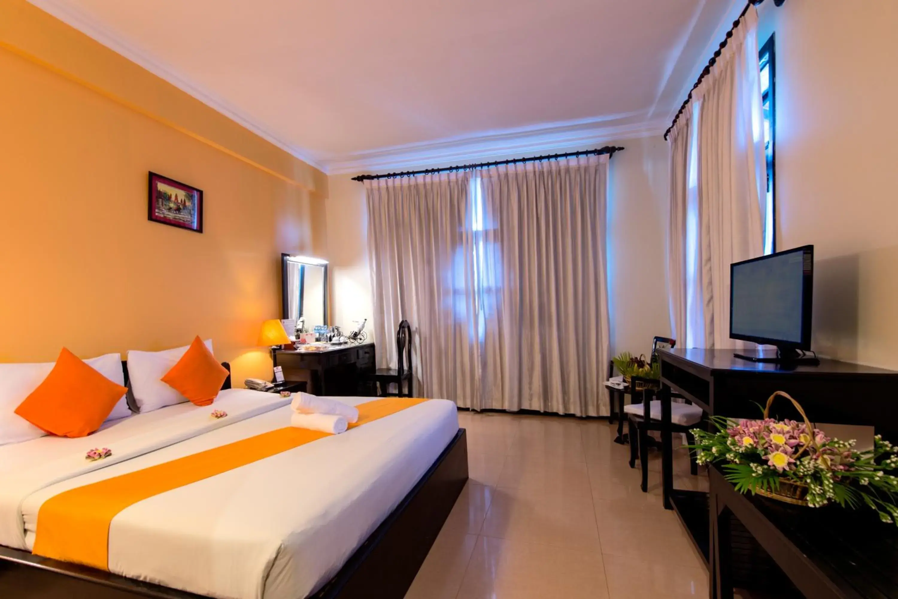 Photo of the whole room, Bed in Angkor Panoramic Boutique Hotel