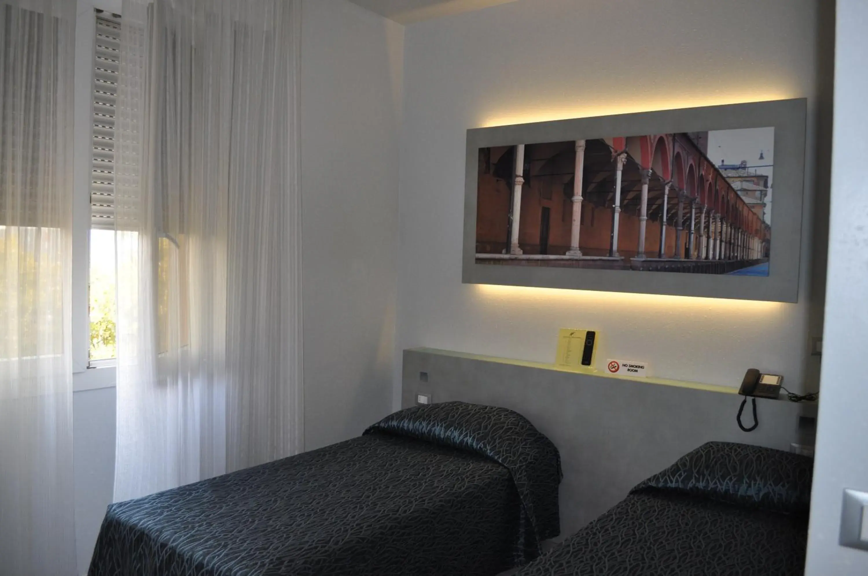 Bed in Hotel Fiera Wellness & Spa