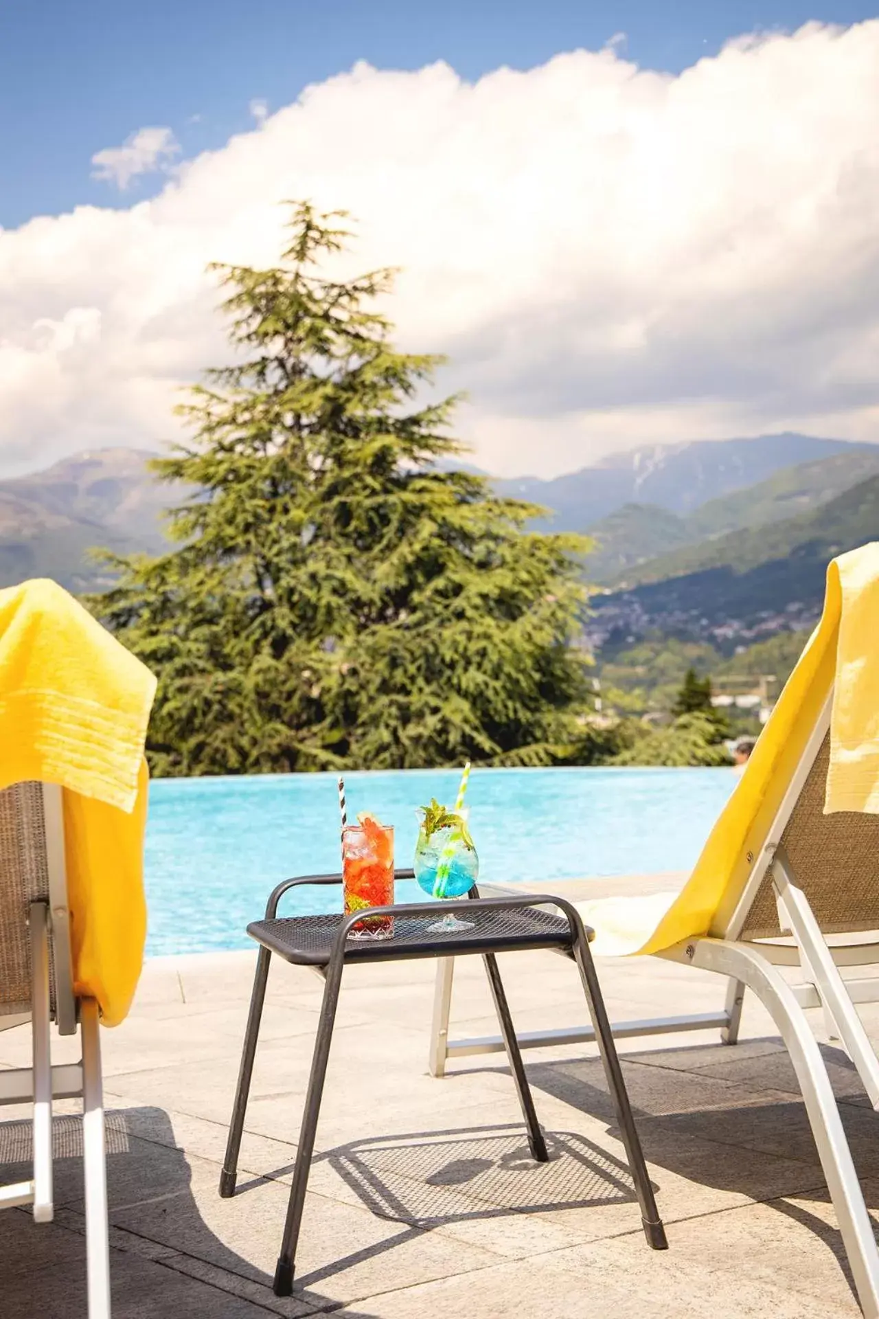 Mountain view, Swimming Pool in Villa Sassa Hotel, Residence & Spa - Ticino Hotels Group
