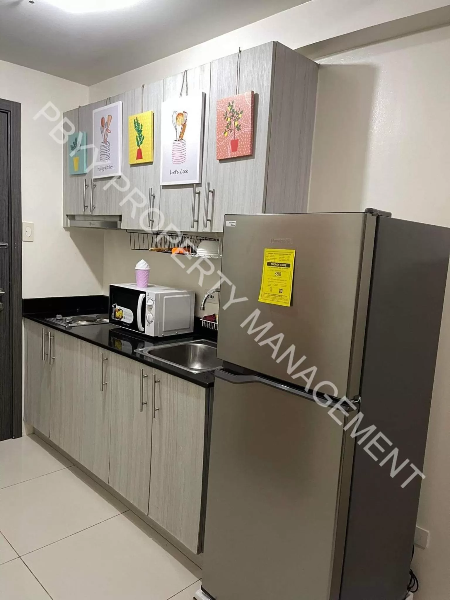 Kitchen or kitchenette, Kitchen/Kitchenette in Green Residences Staycation by PBYY