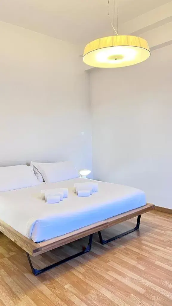 Bed in Imago Plus Hotel