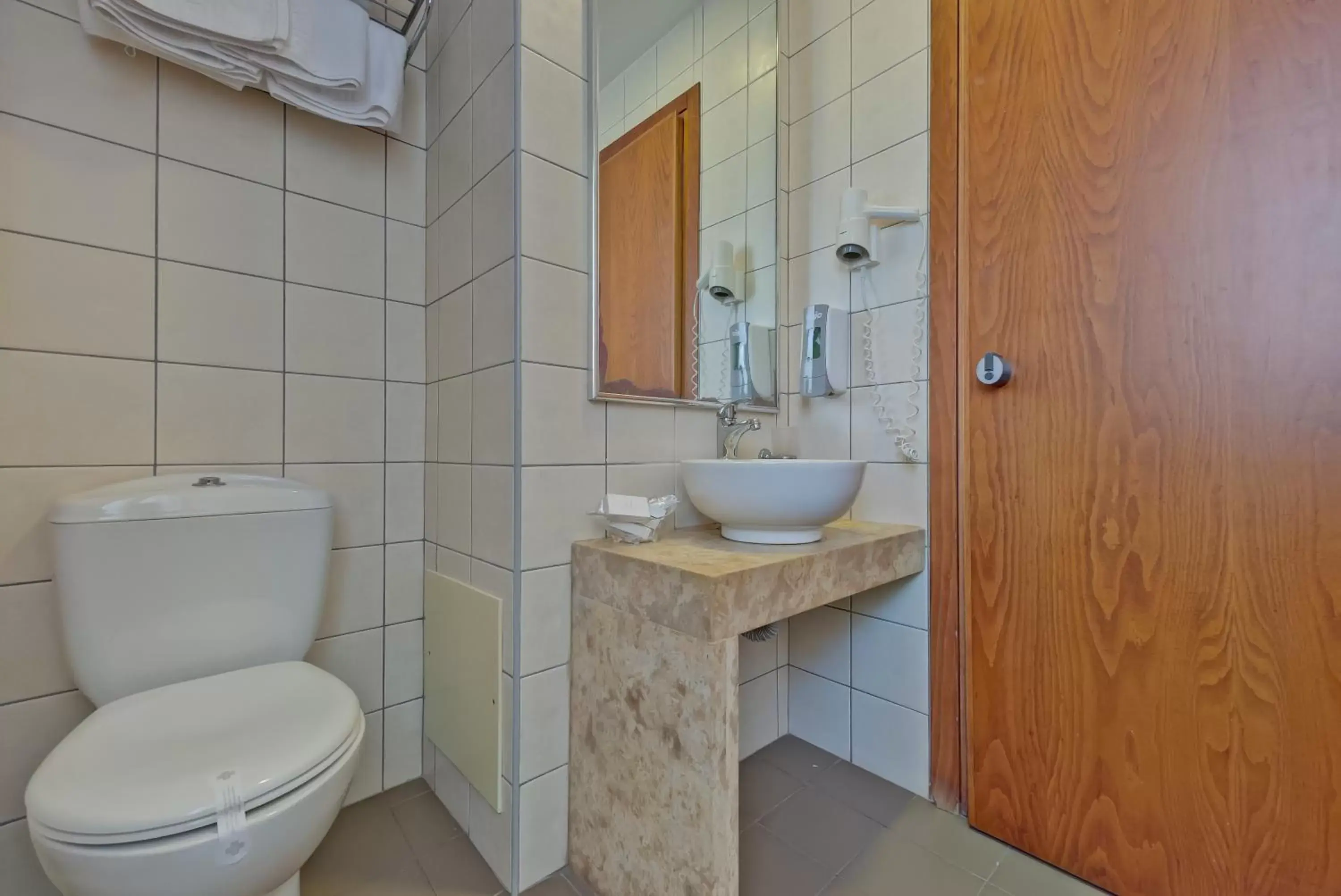 Toilet, Bathroom in Marin Hotel