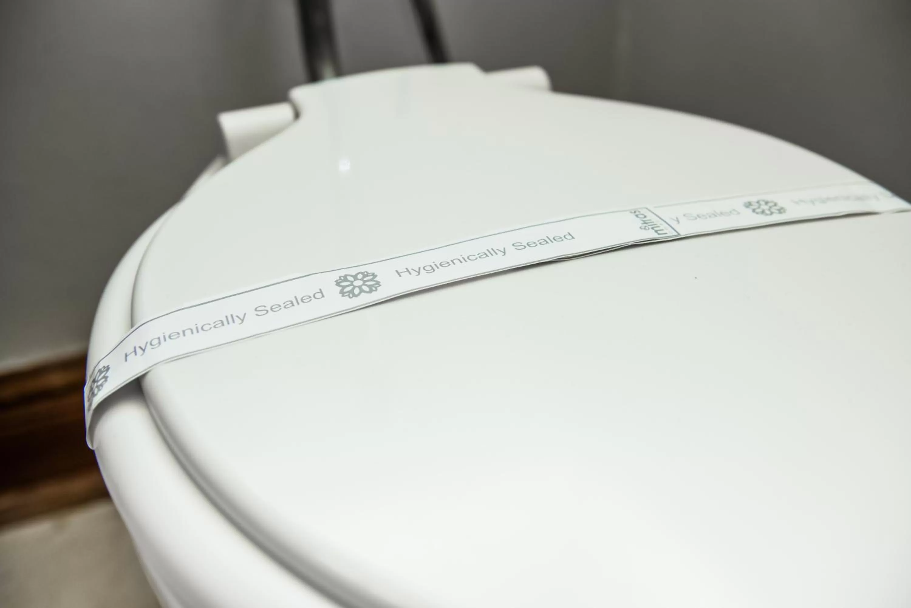 Toilet in Belaire Suites Hotel