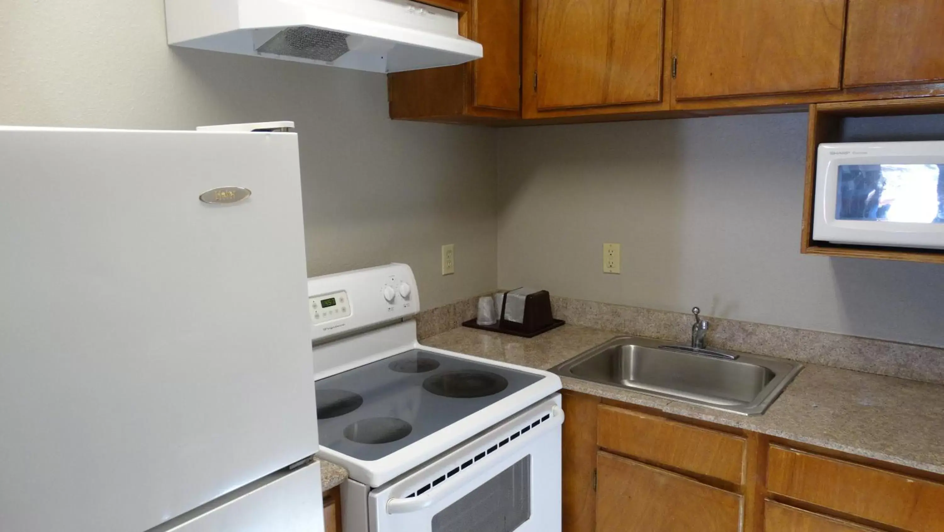 Kitchen or kitchenette, Kitchen/Kitchenette in Regency Inn and Suites Humble