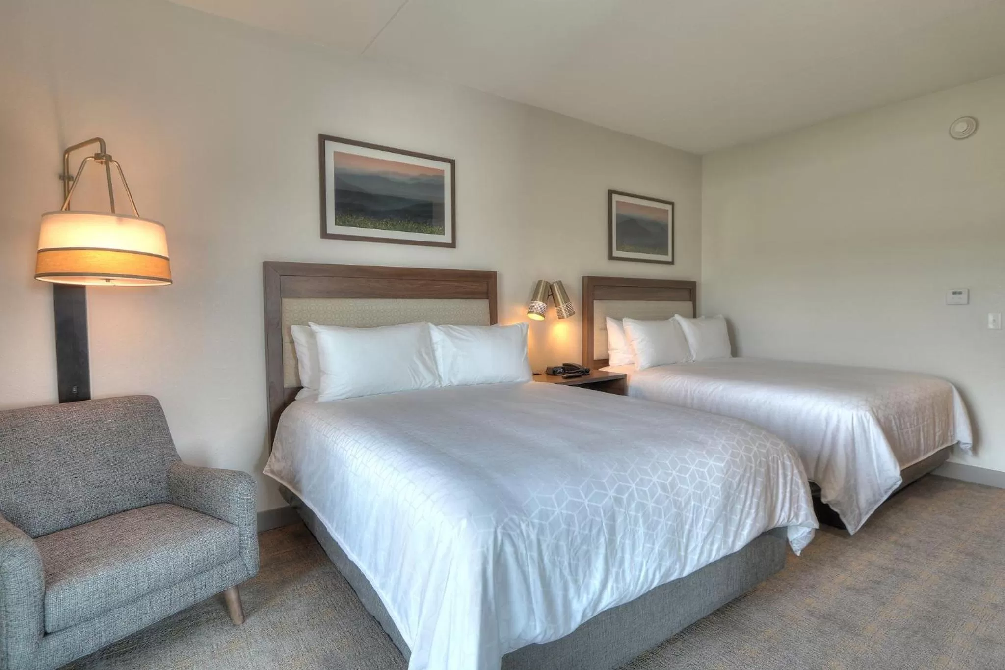 Photo of the whole room, Bed in Holiday Inn & Suites Pigeon Forge Convention Center by IHG