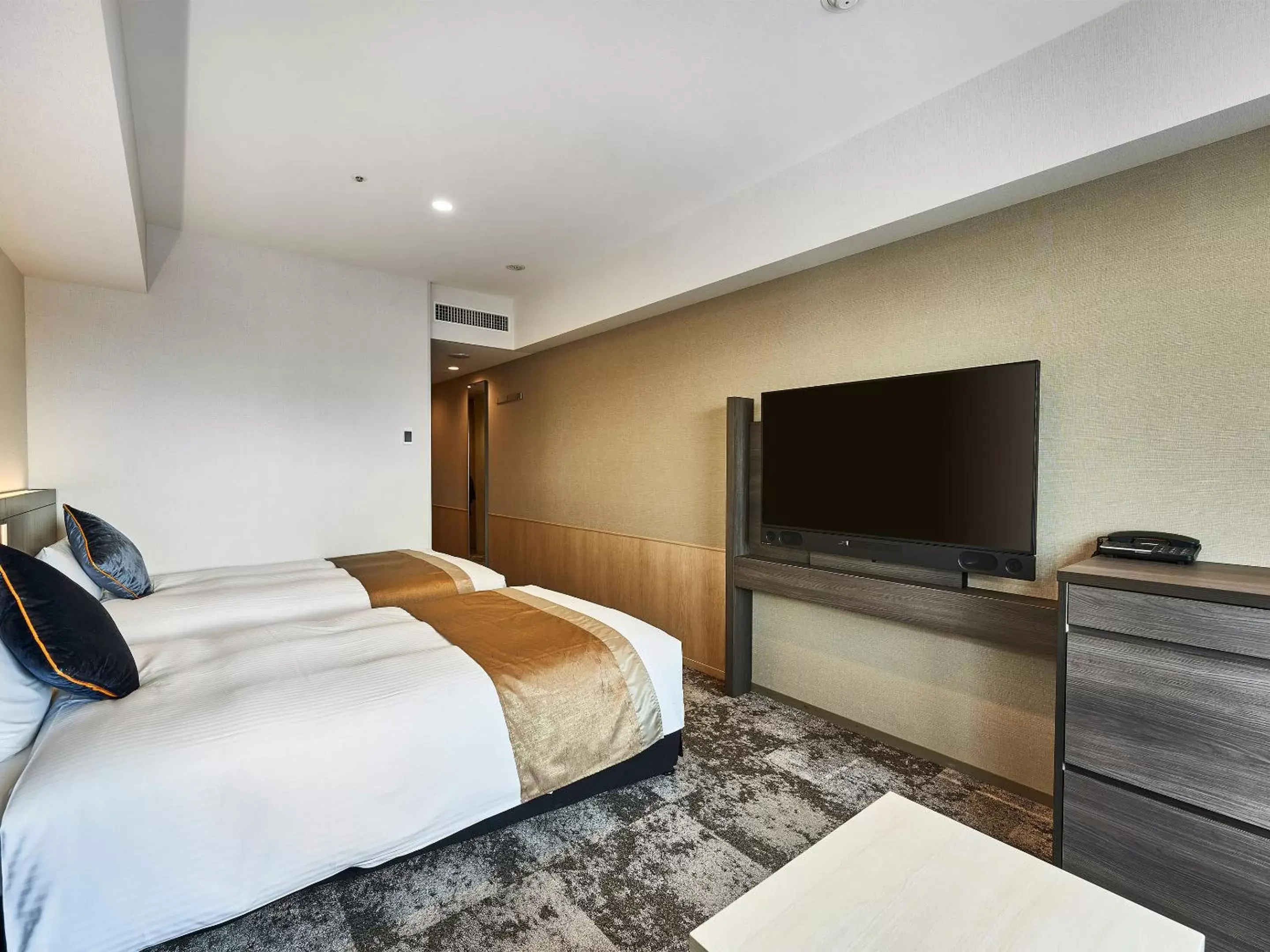 Bed in DEL style Osaka-Shinsaibashi by Daiwa Roynet Hotel