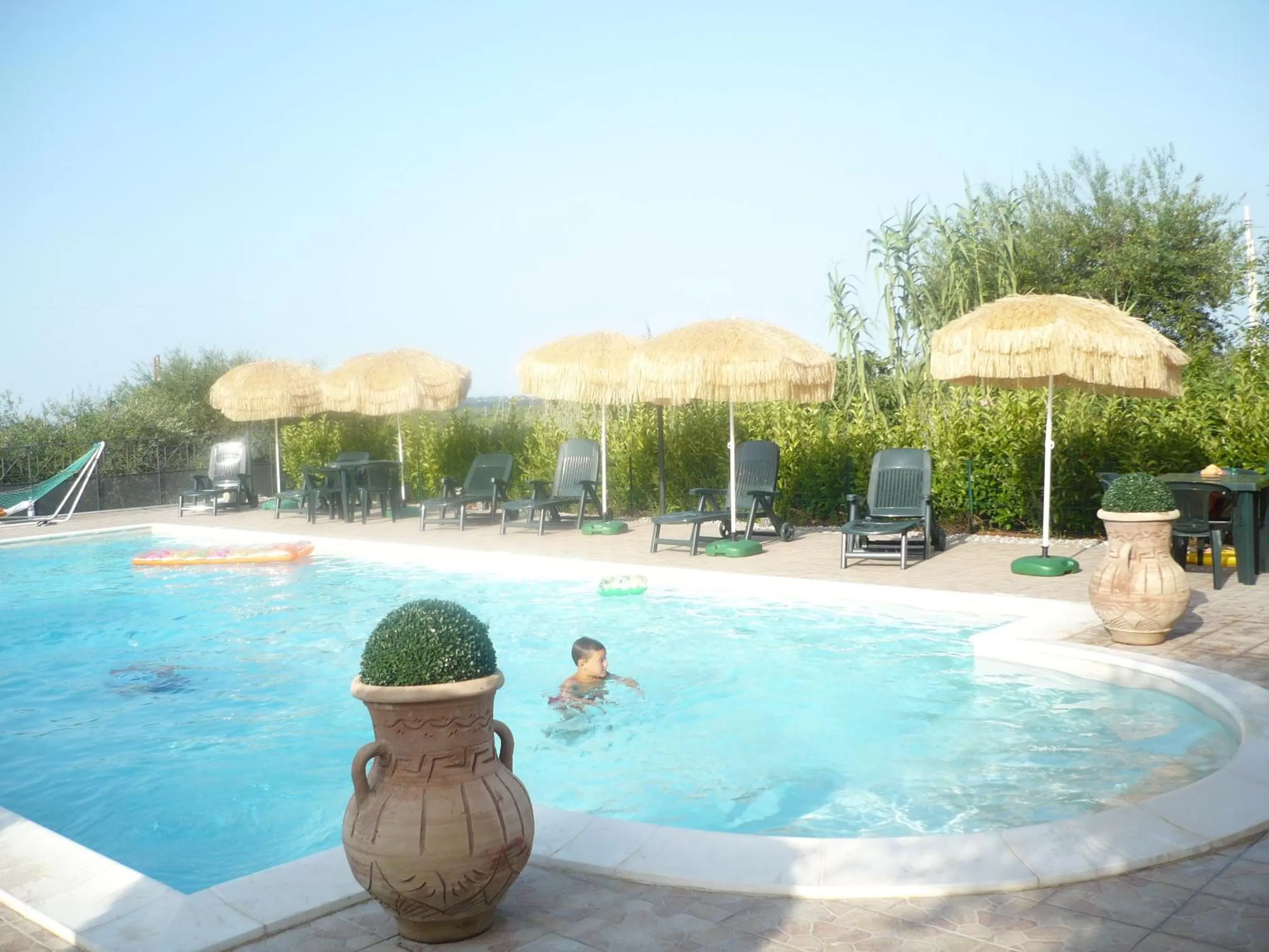 Swimming pool in L'Isola Felice e Trulli Sotto Le Stelle