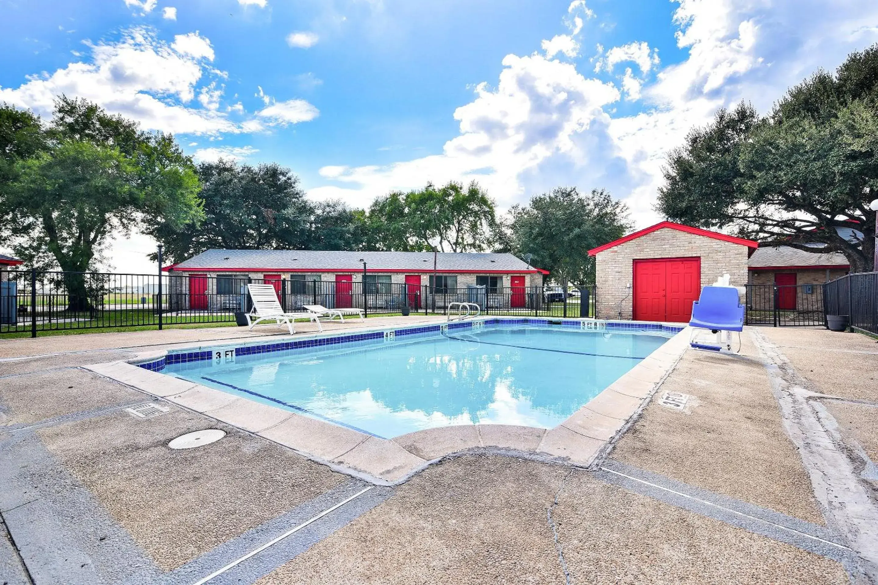 Swimming Pool in Americas Best Value Inn Lockhart TX