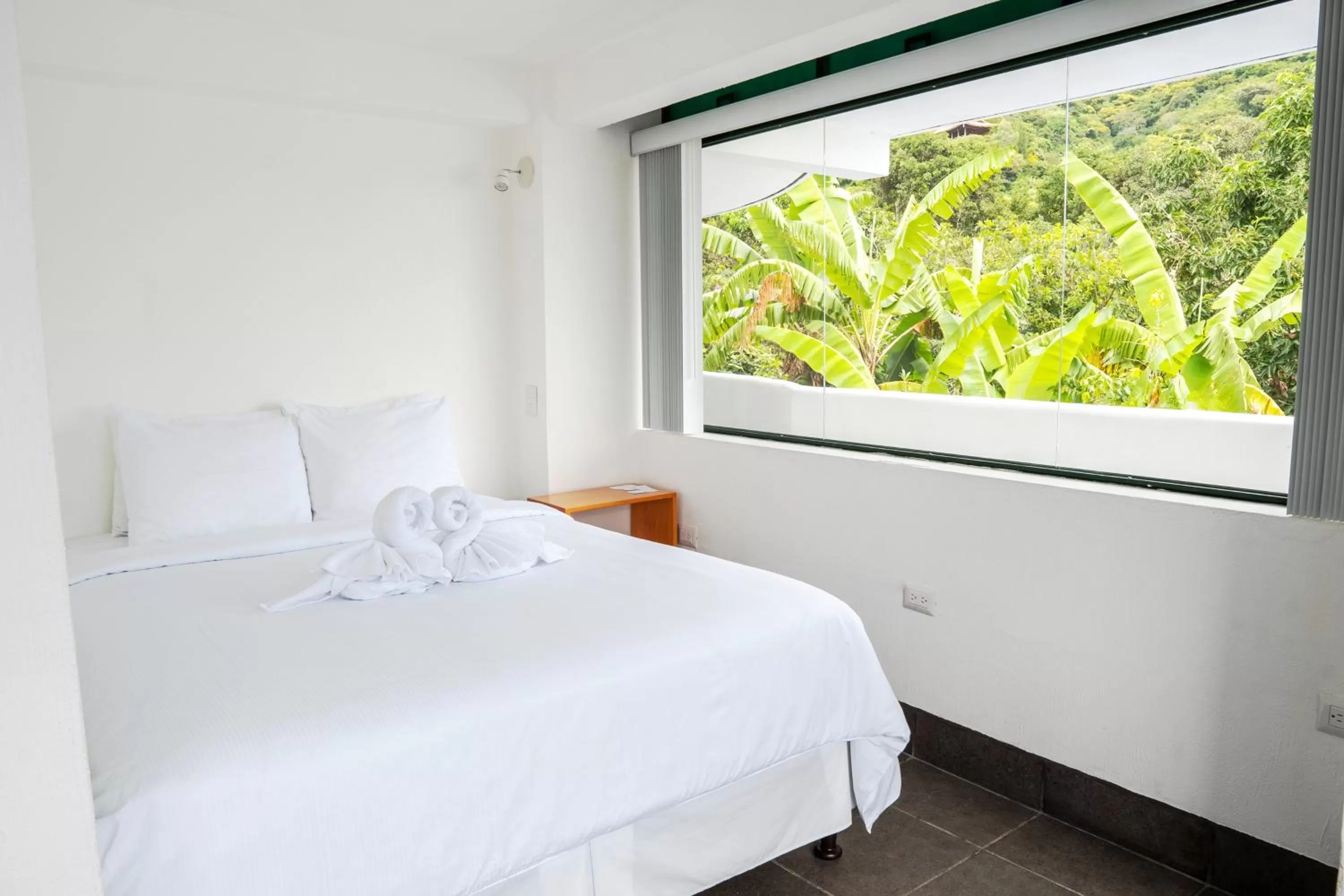 Bed in El Dragon Hotel