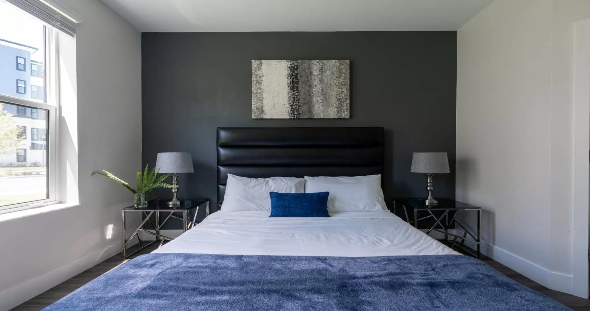 Bed in Westshore Apartments by Barsala