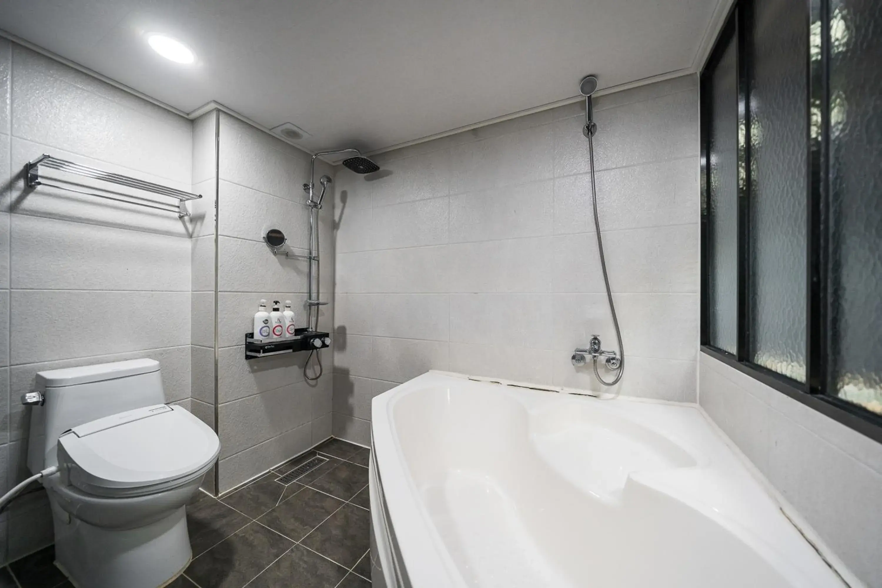 Bathroom in G Stay Malu Hotel
