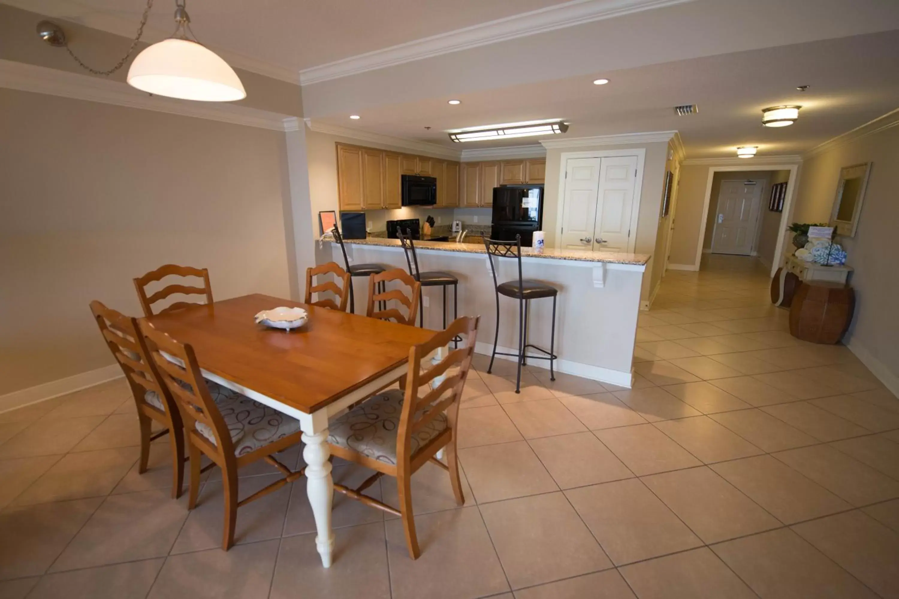 Dining area in Escapes! To The Shores Orange Beach, A Ramada by Wyndham