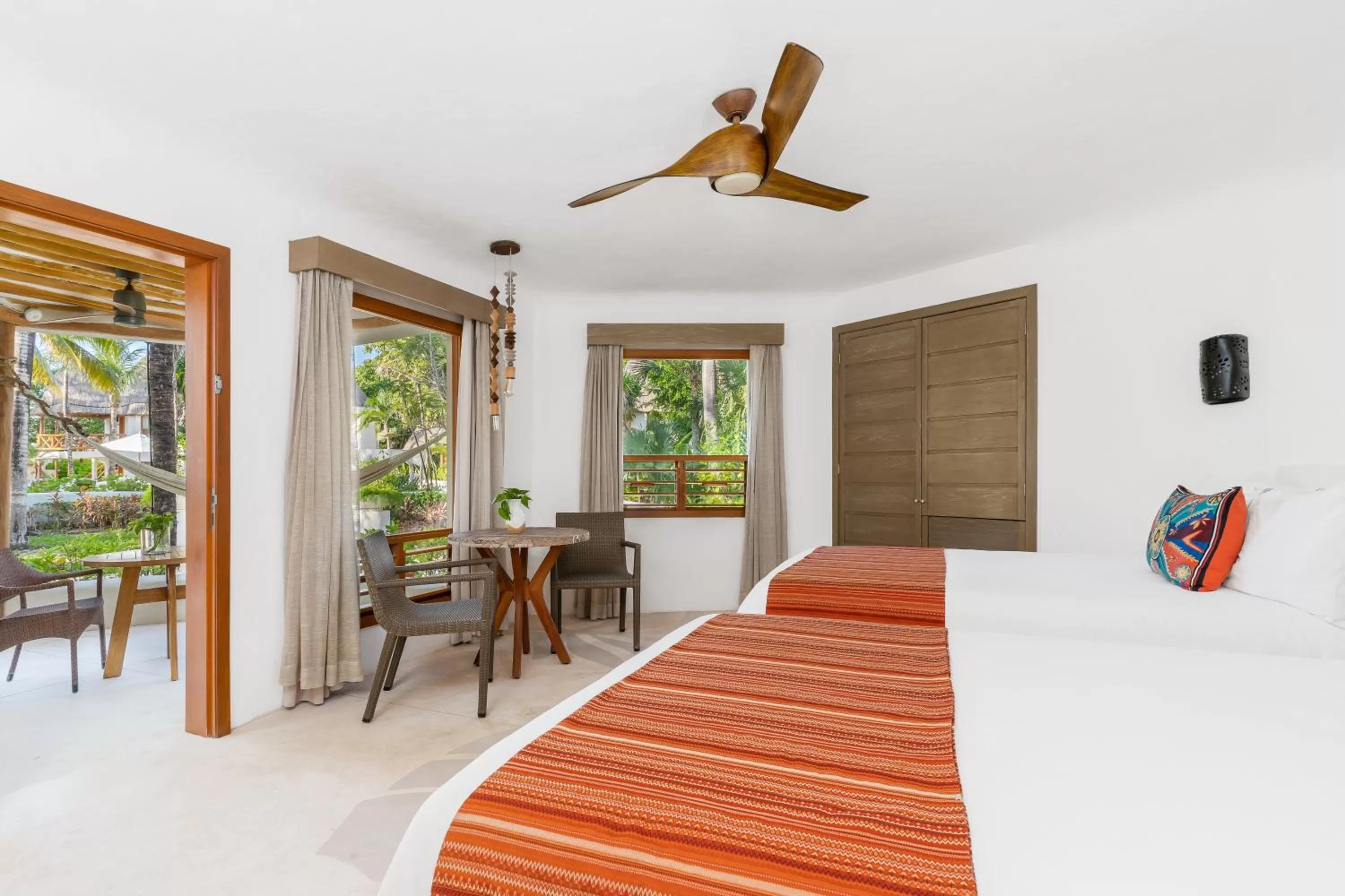 Bed in Mahekal Beach Front Resort & Spa