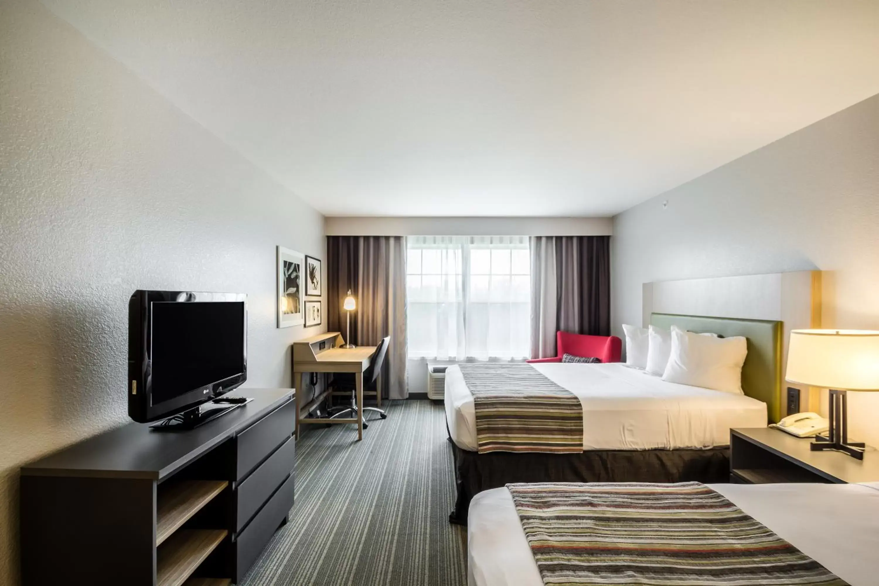 Queen Room with Two Queen Beds and Roll-In Shower - Disability Access in Country Inn & Suites by Radisson, Fond du Lac, WI Queen Room with Two Queen Beds and Roll-In Shower - Disability Access in Country Inn & Suites by Radisson, Fond du Lac, WI