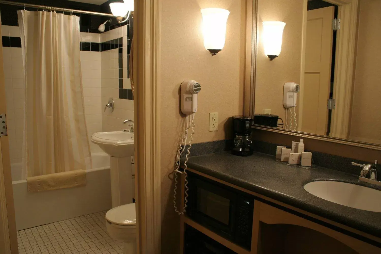 Bathroom in Ambassador Hotel Milwaukee, Trademark Collection by Wyndham