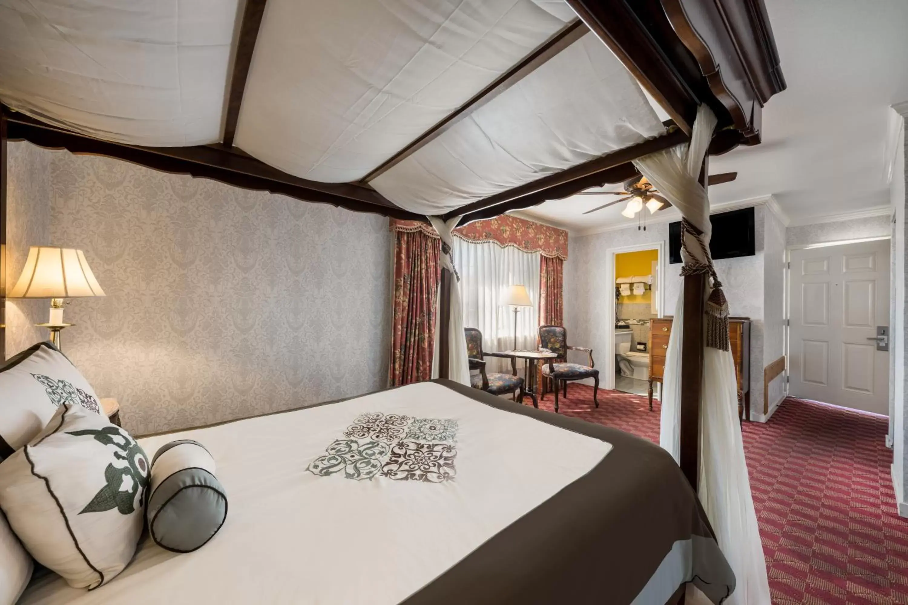 Bed in Carmel Inn & Suites
