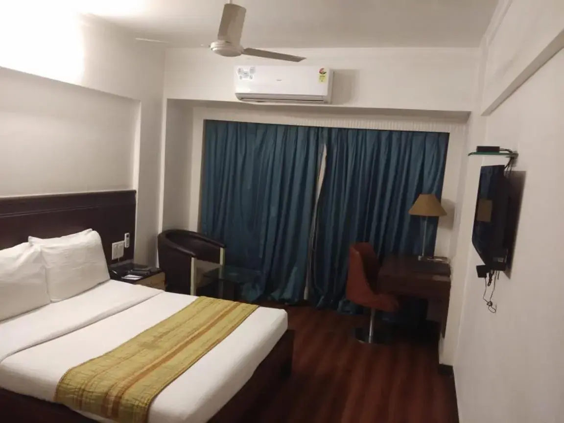 Bed in Hotel Yogi Metropolitan