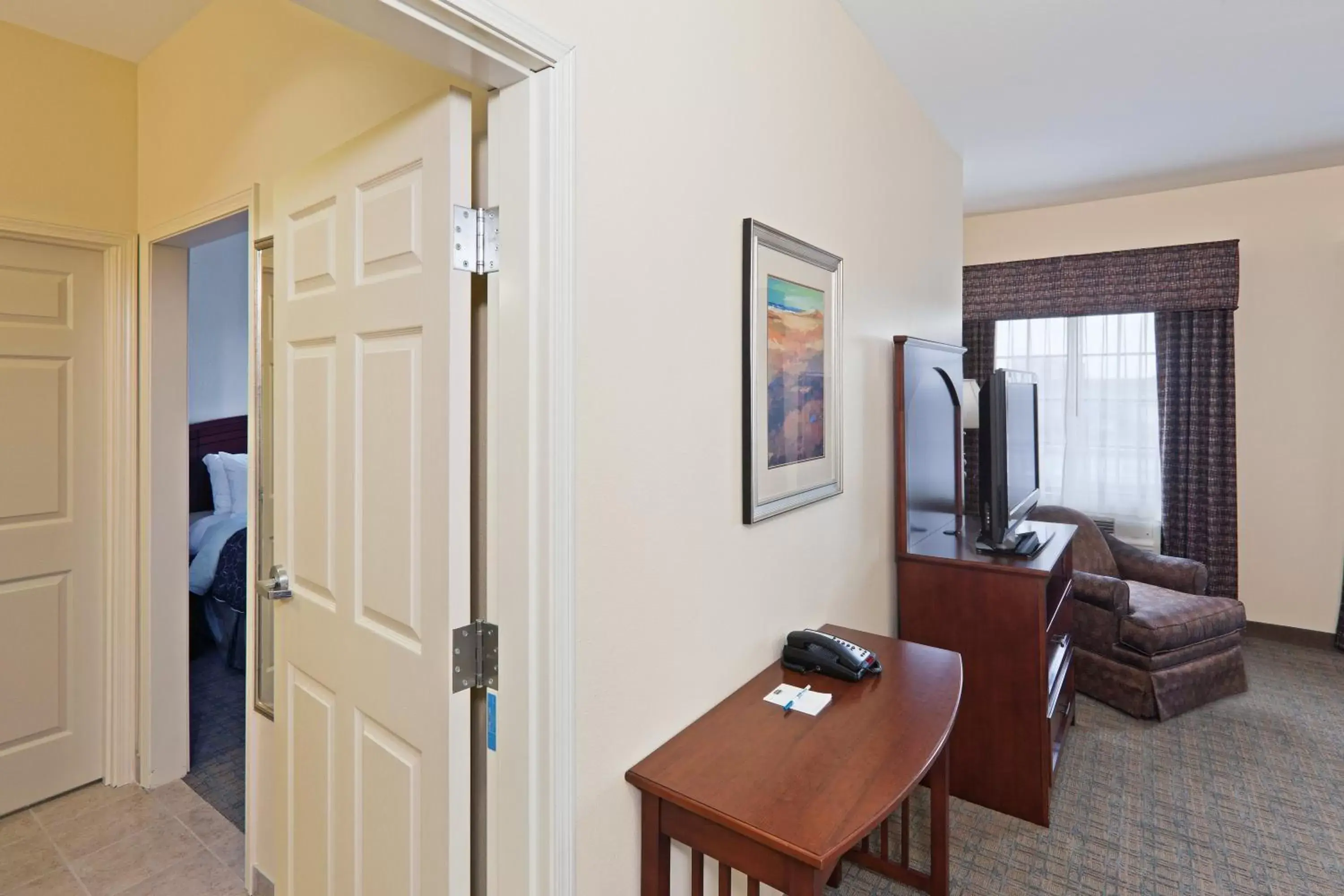 Photo of the whole room, TV/Entertainment Center in Staybridge Suites Oklahoma City, an IHG Hotel