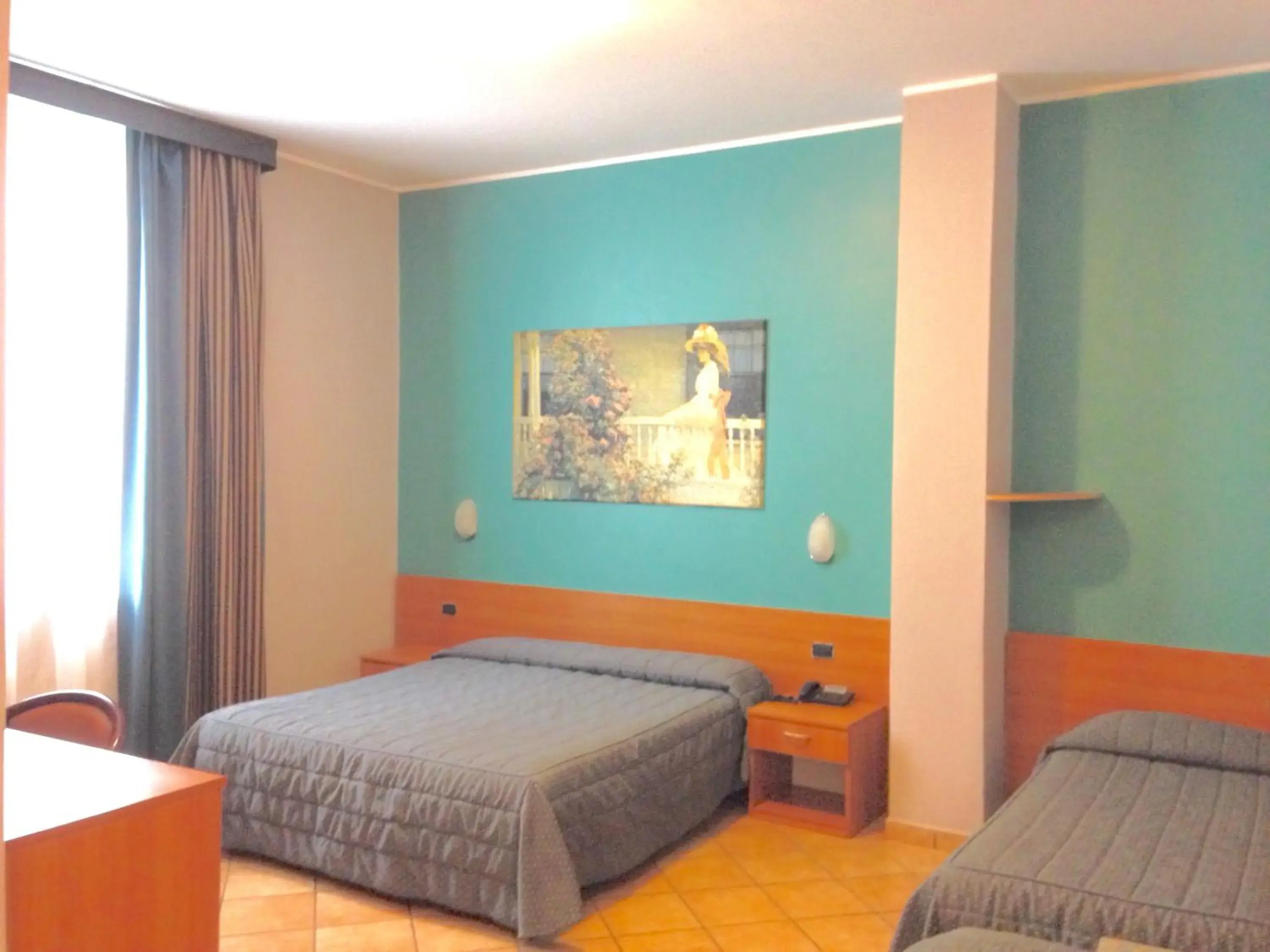 Photo of the whole room, Bed in Hotel Ristorante Cervo Malpensa