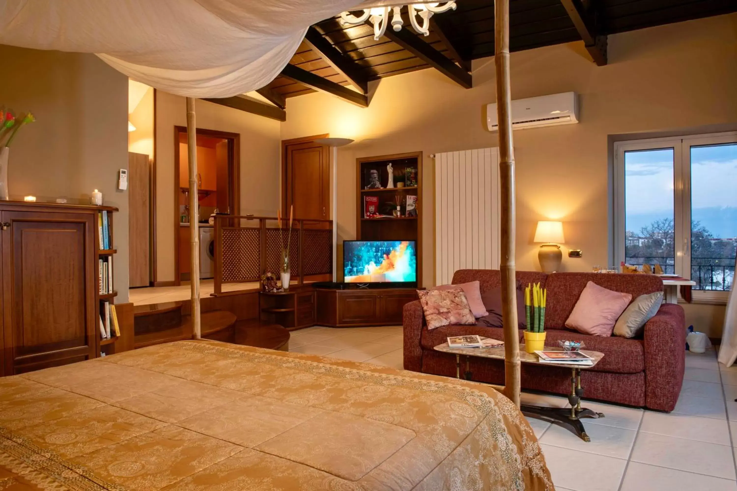 Bed, TV/Entertainment Center in A'Luggetella